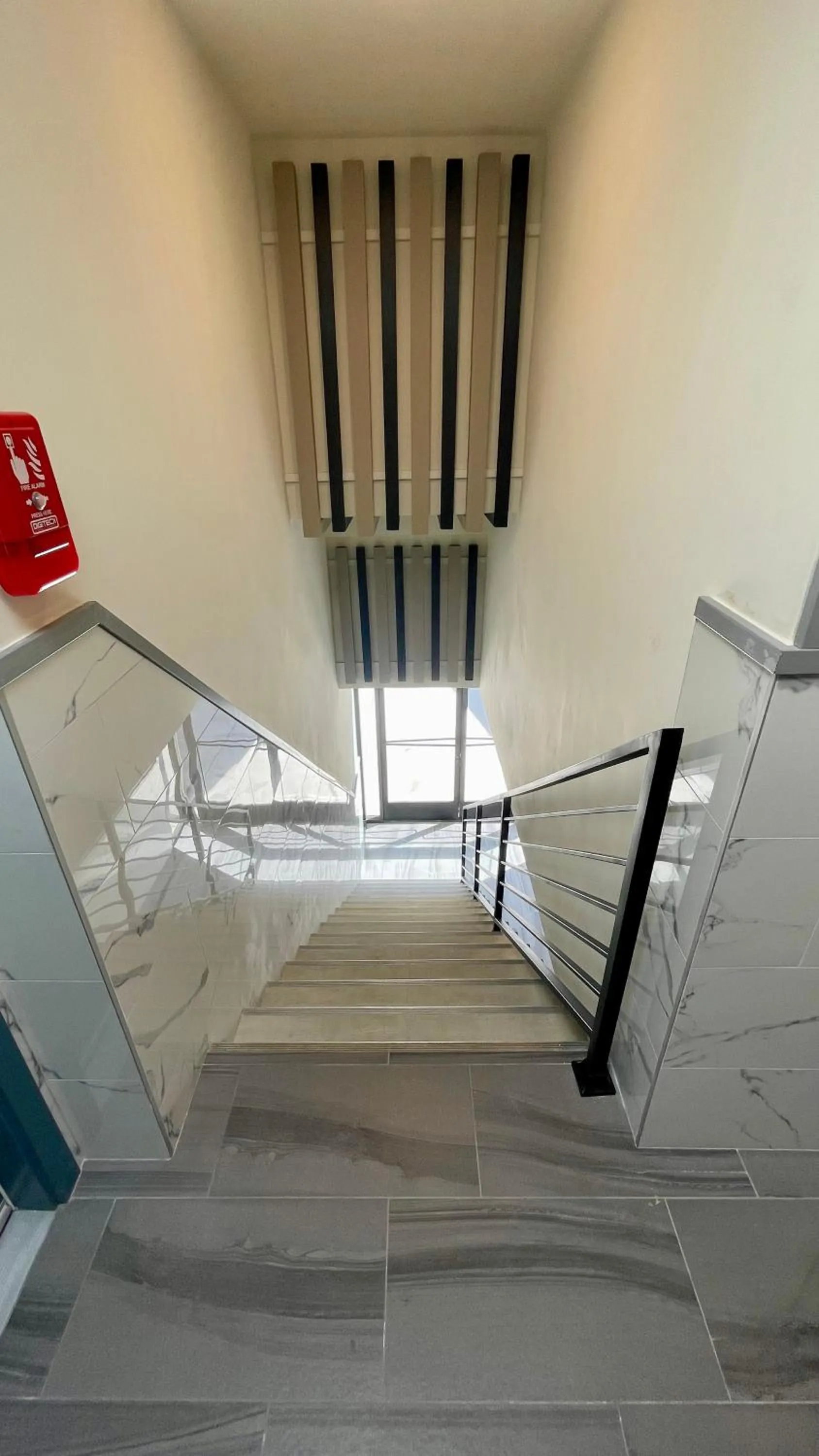 Bed in Quintessence ApartHotel