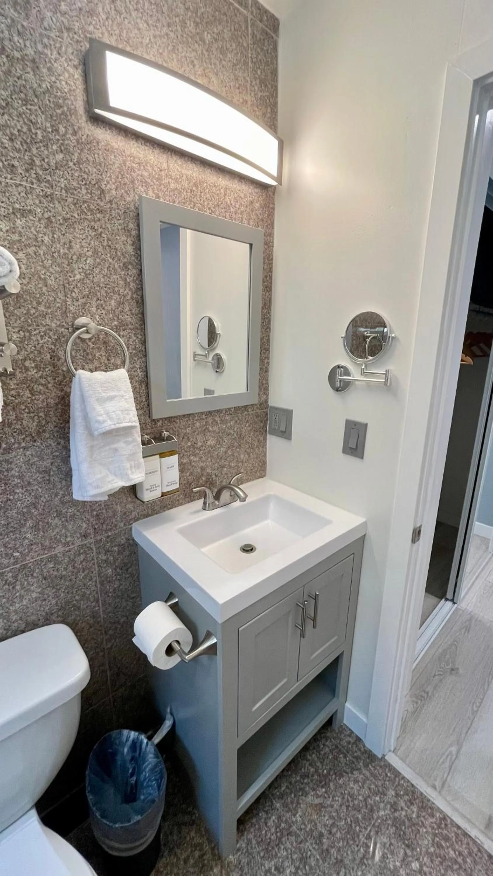 Bathroom in Quintessence ApartHotel