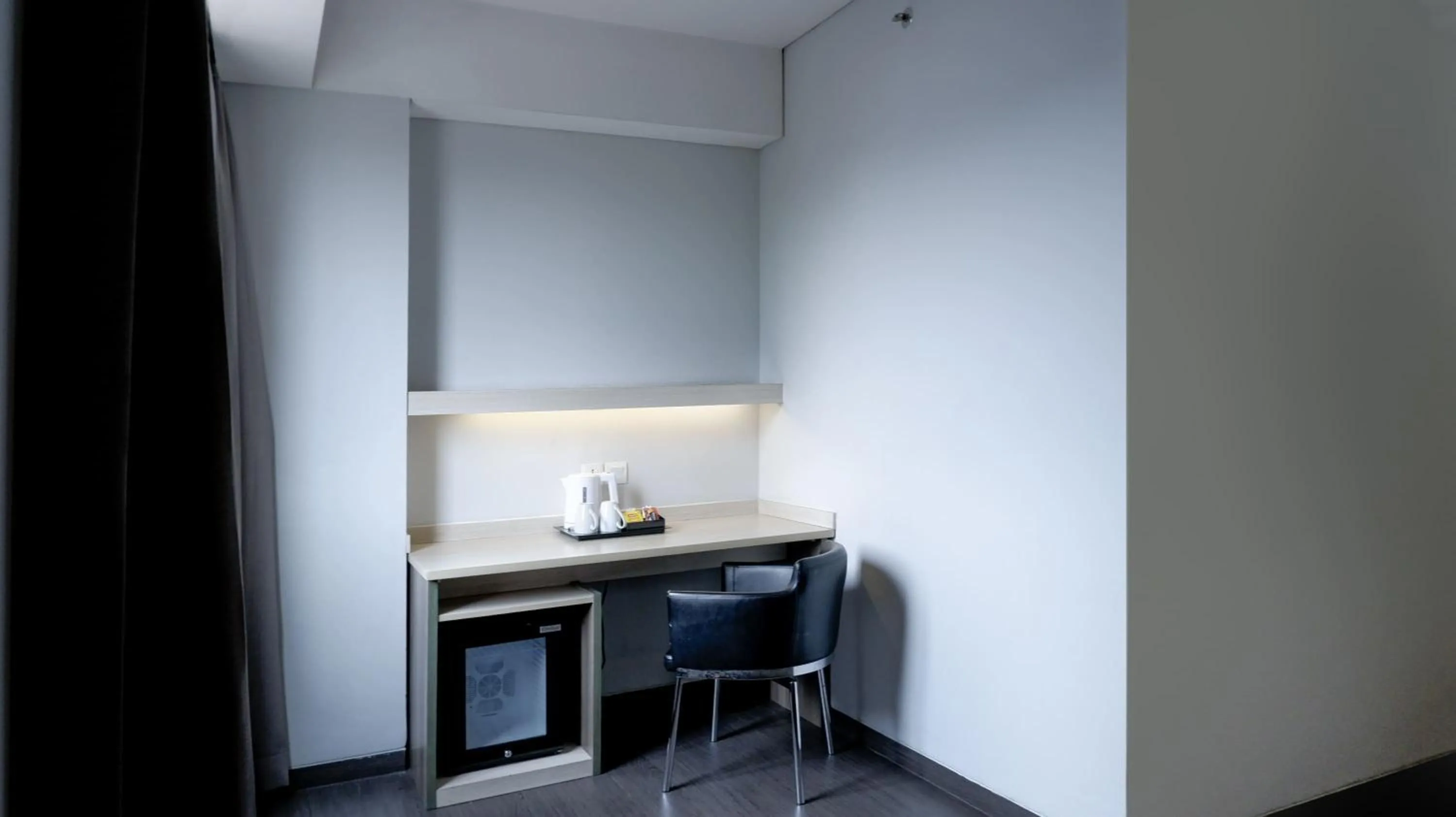 Seating area in Swiss-Belexpress Cideng