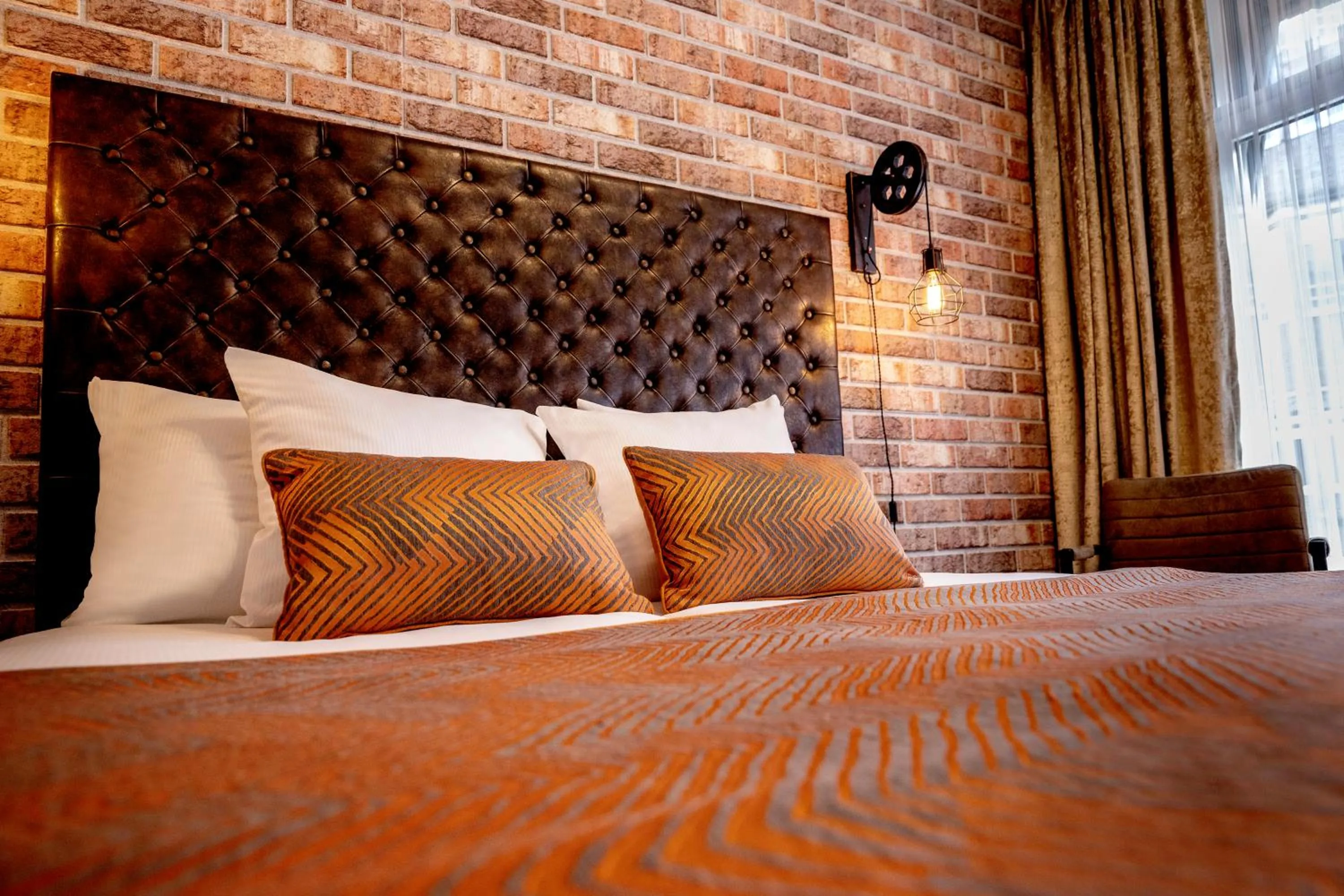 Bed in Jupiter Hotel