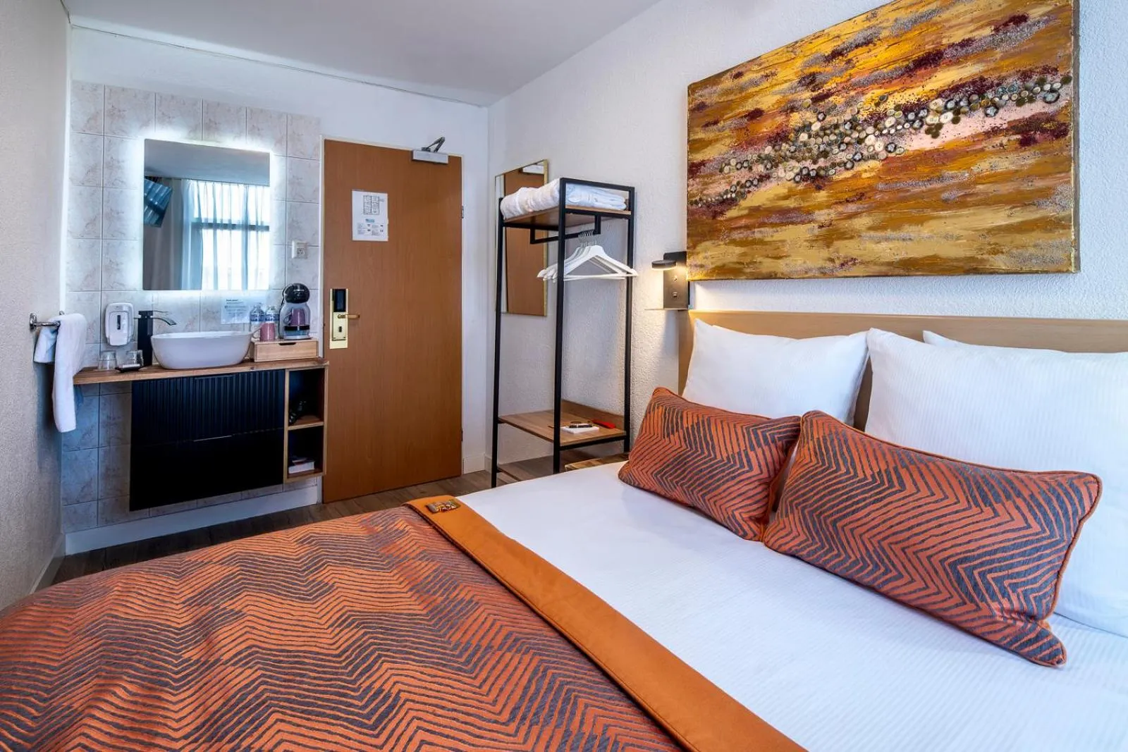 Bed in Jupiter Hotel