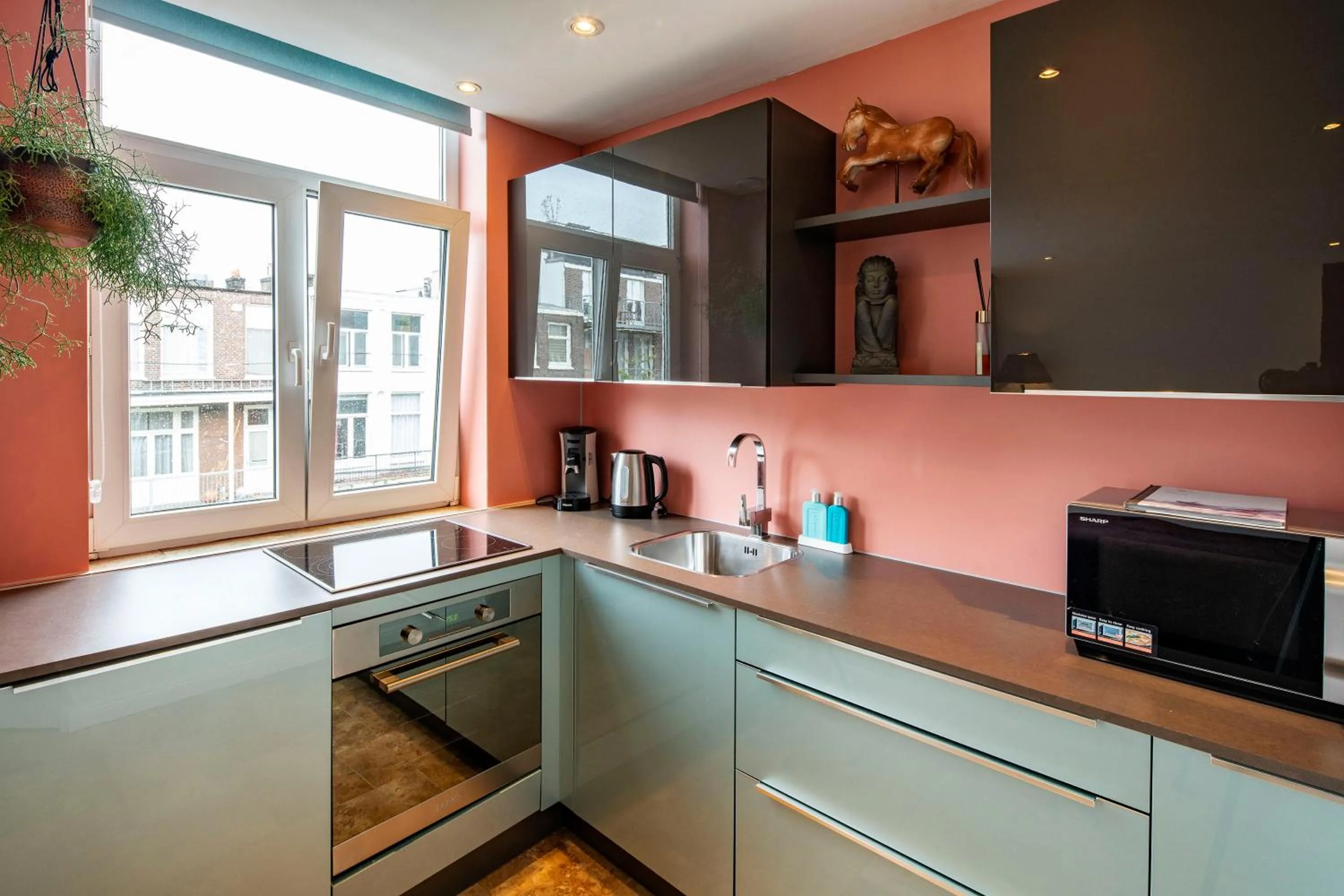 Kitchen or kitchenette in Jupiter Hotel