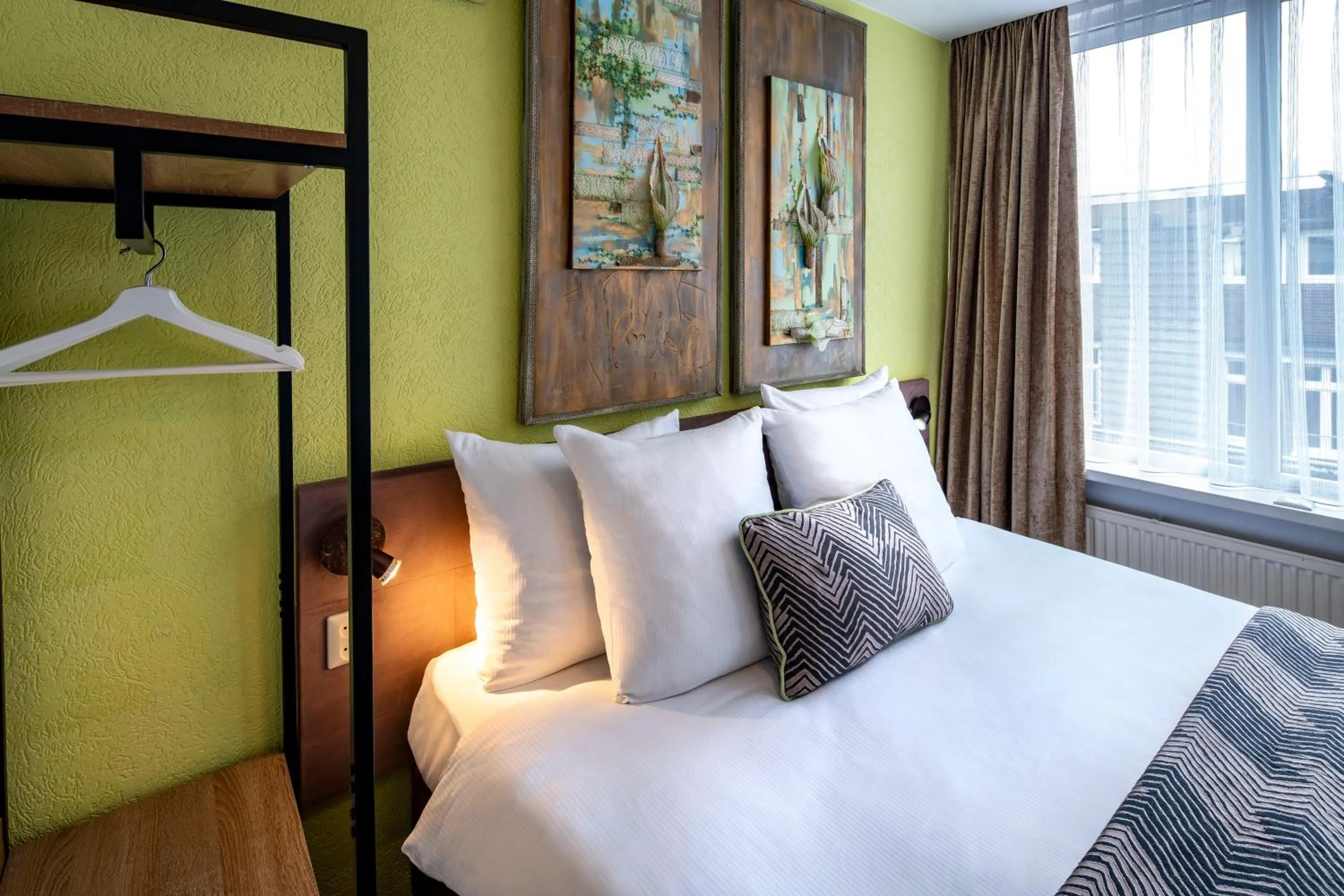 Bed in Jupiter Hotel