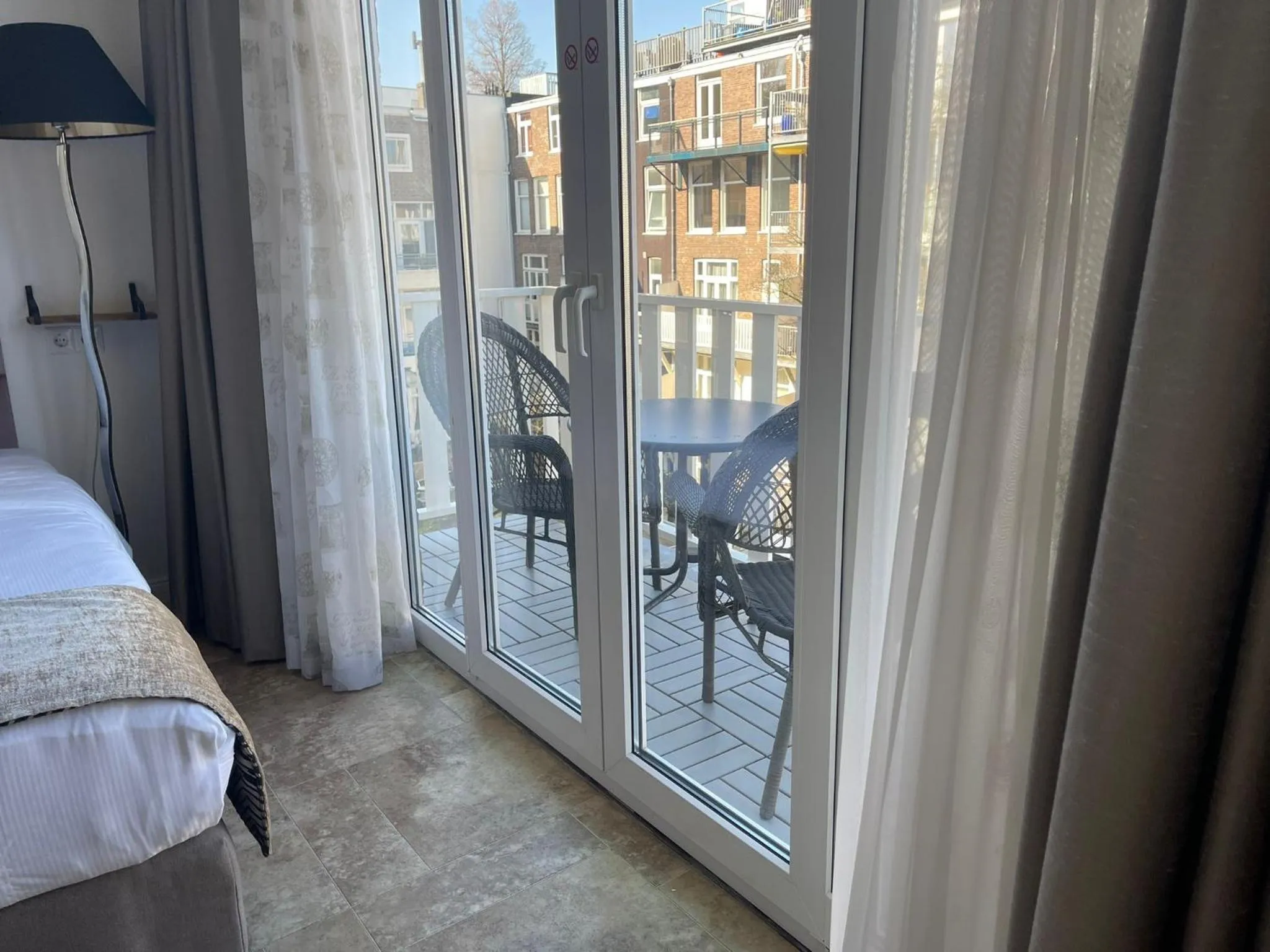 Balcony/Terrace, Bed in Jupiter Hotel