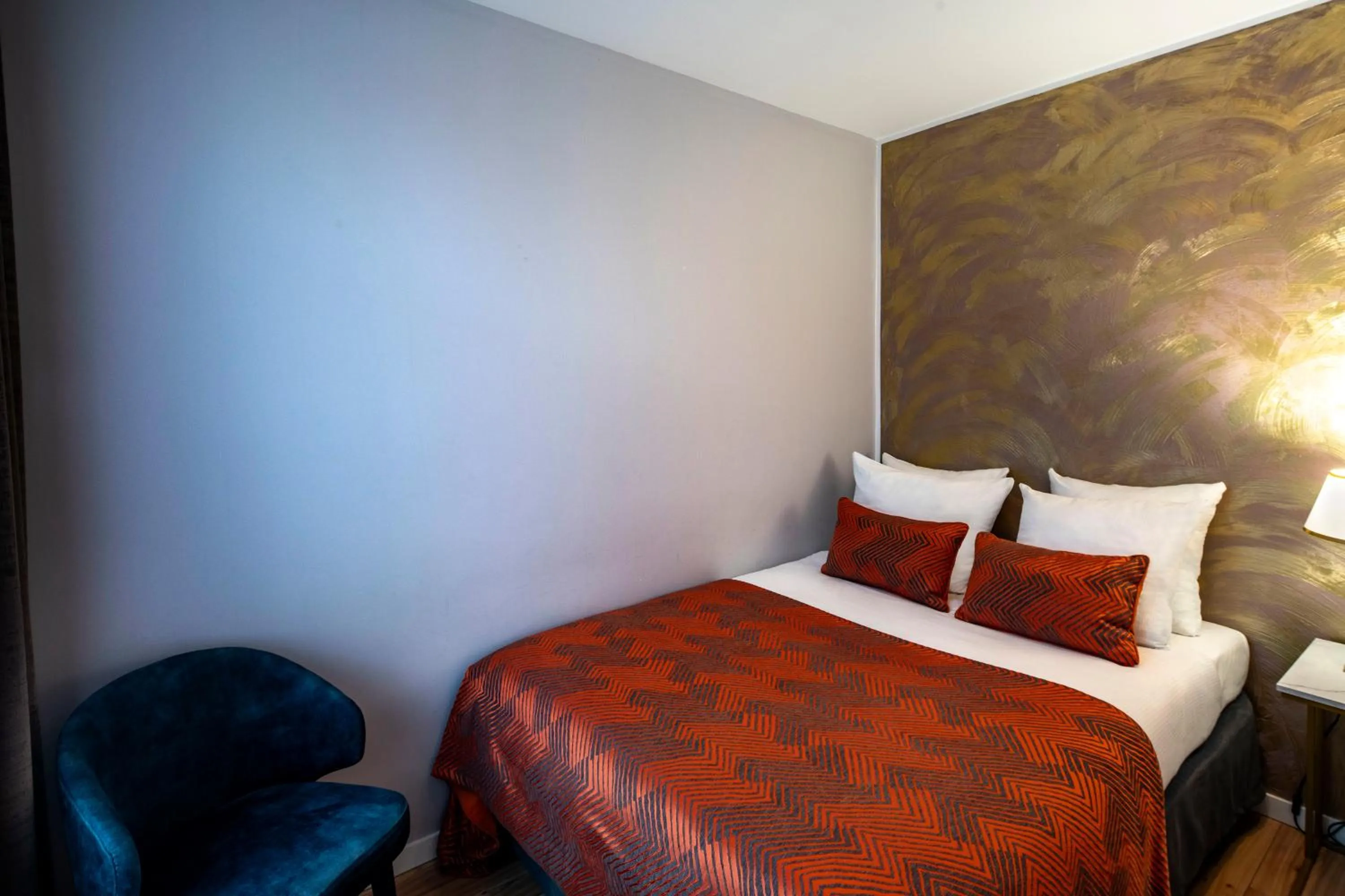 Bed in Jupiter Hotel