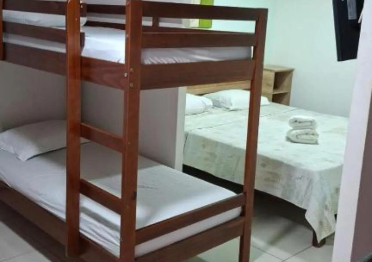 Property building, Bed in Pousada Navegantes Beach
