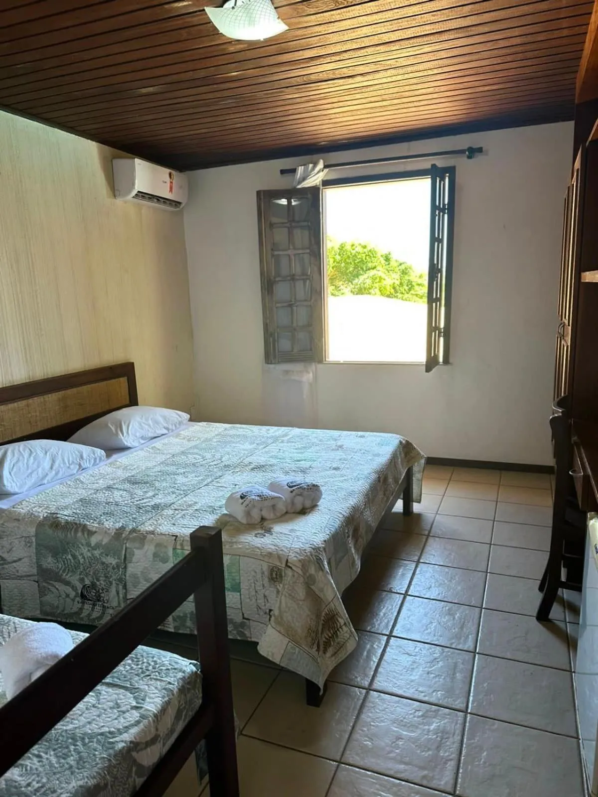 Bed in Pousada Navegantes Beach