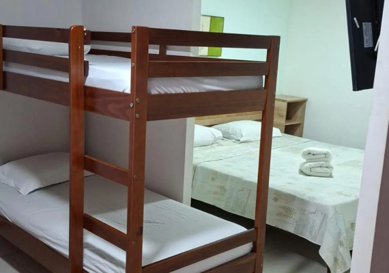 Property building, Bed in Pousada Navegantes Beach