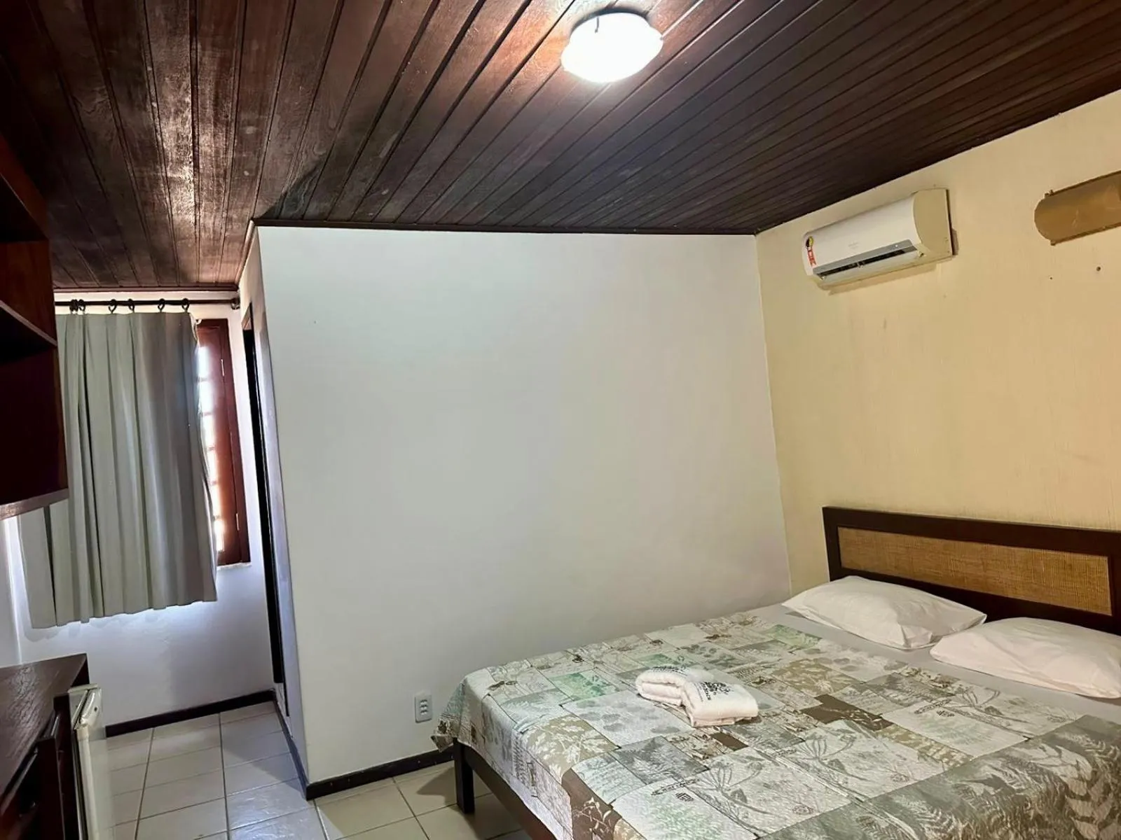 Bed in Pousada Navegantes Beach