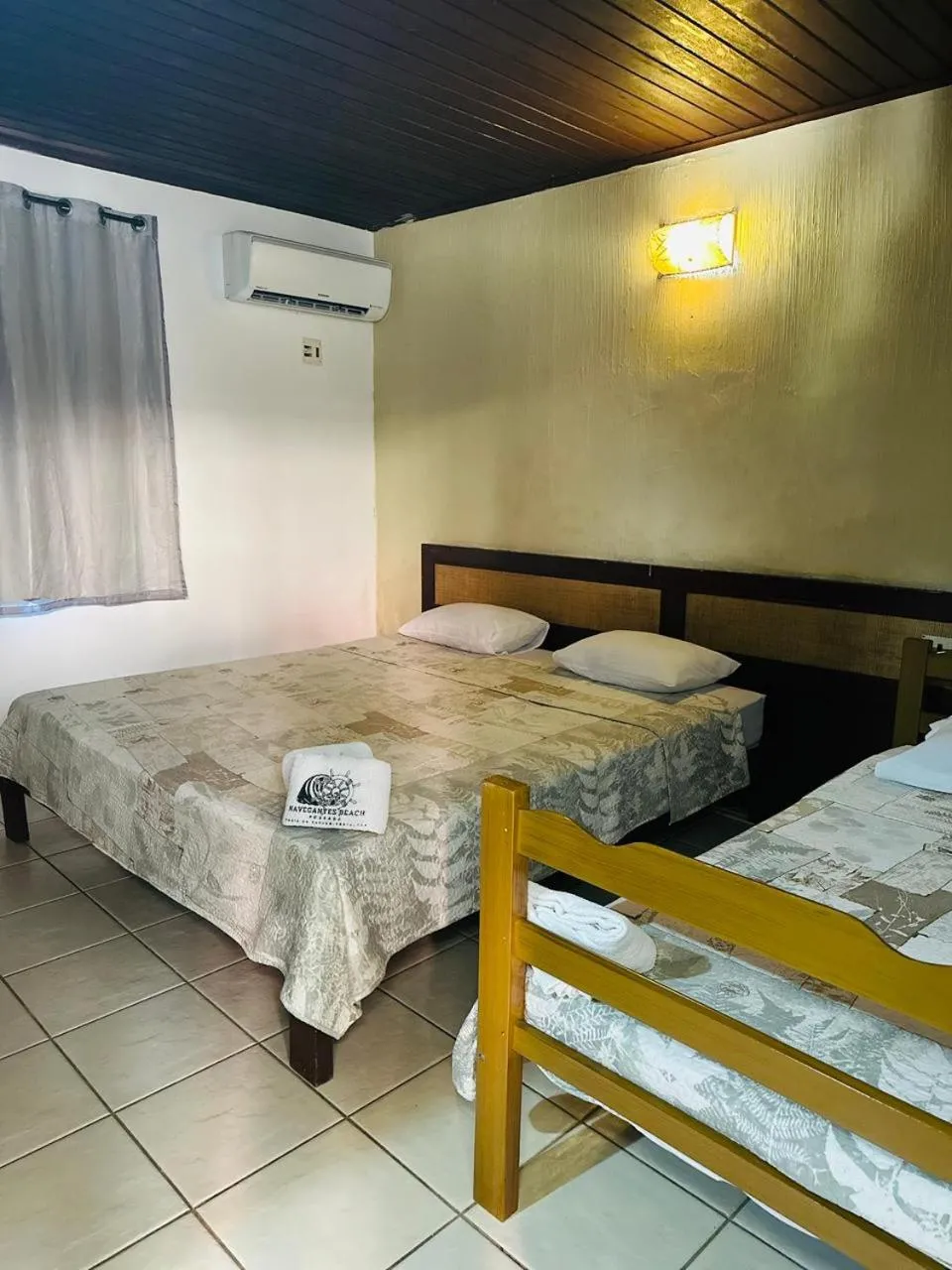 Bed in Pousada Navegantes Beach