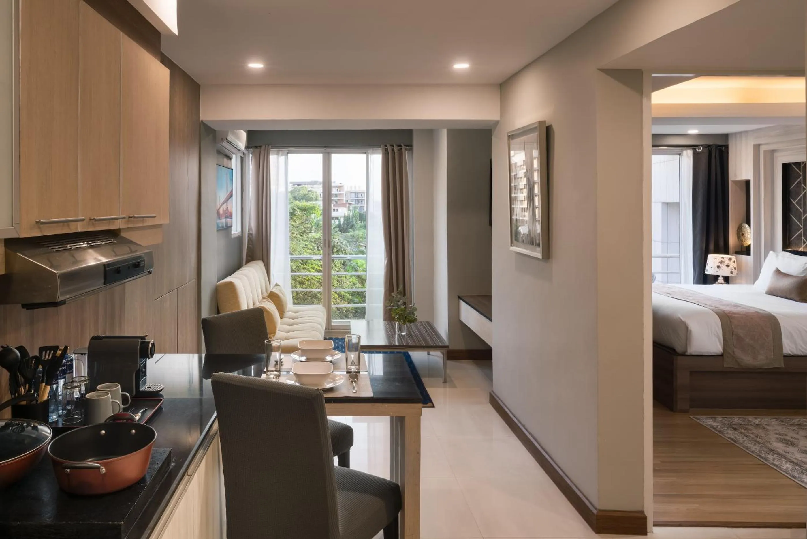 Living room, Bed in Aspira Suites Sukhumvit 20