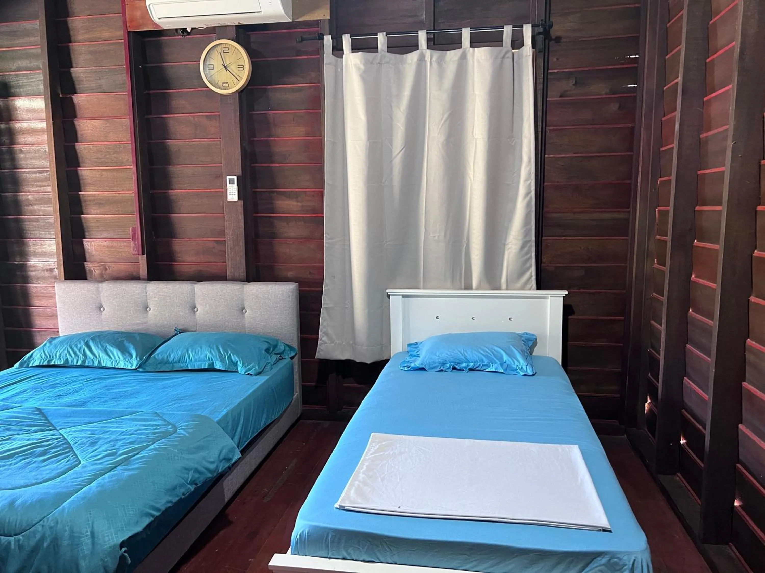 Bedroom in Hotel O Sri Ayu Inn