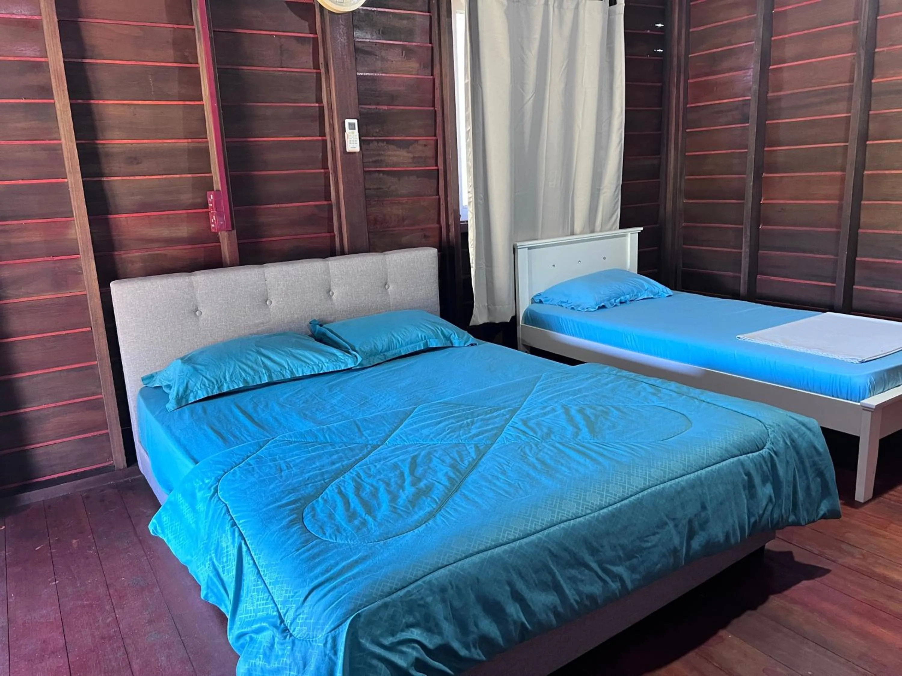 Bedroom in Hotel O Sri Ayu Inn