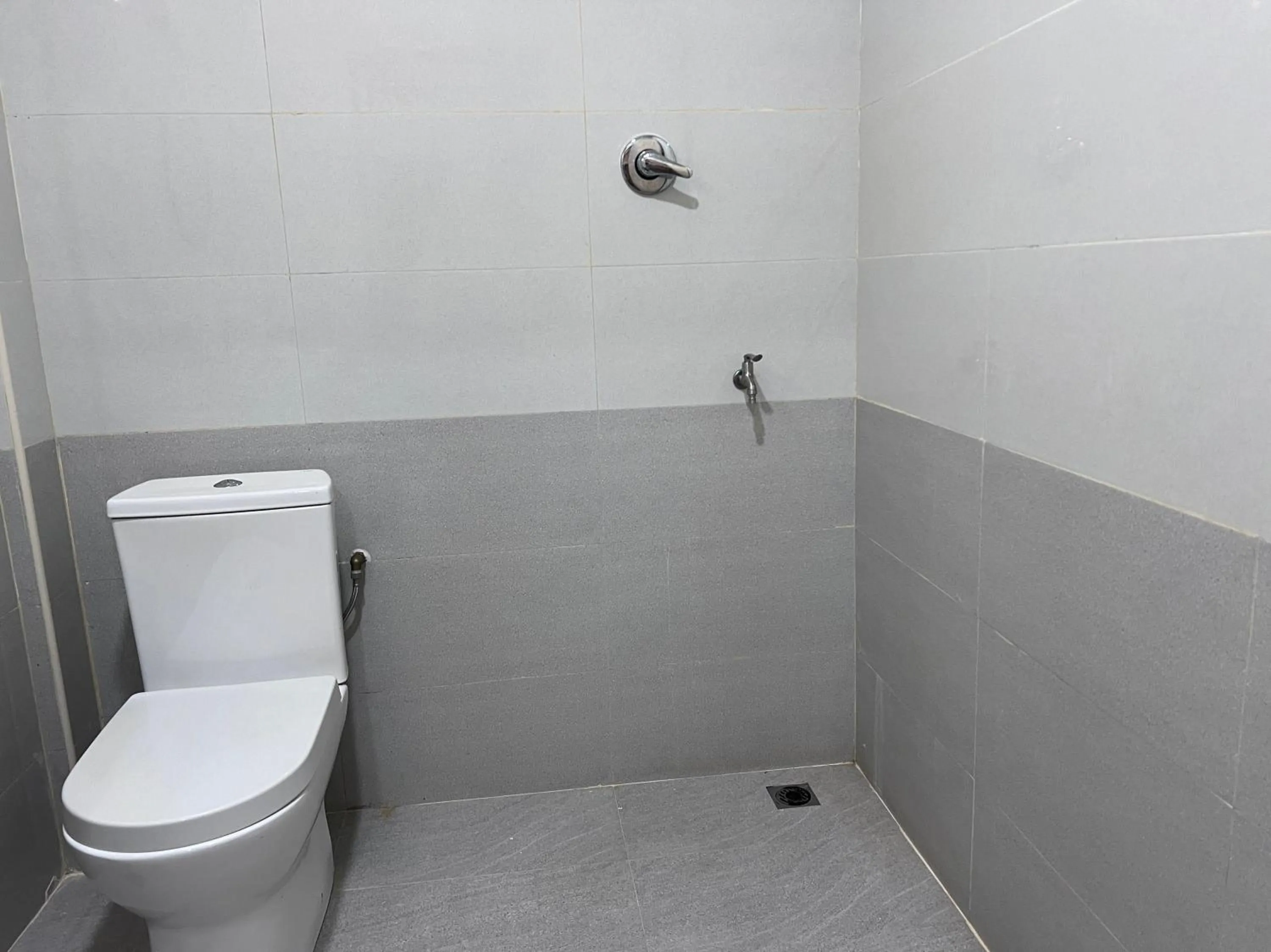 Bathroom in Hotel O Sri Ayu Inn