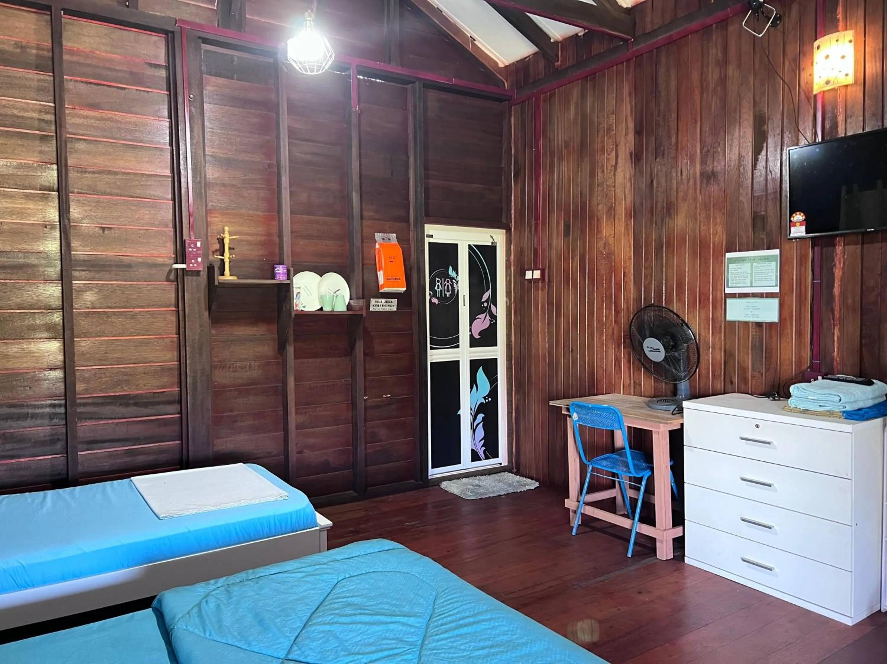 Bedroom in Hotel O Sri Ayu Inn