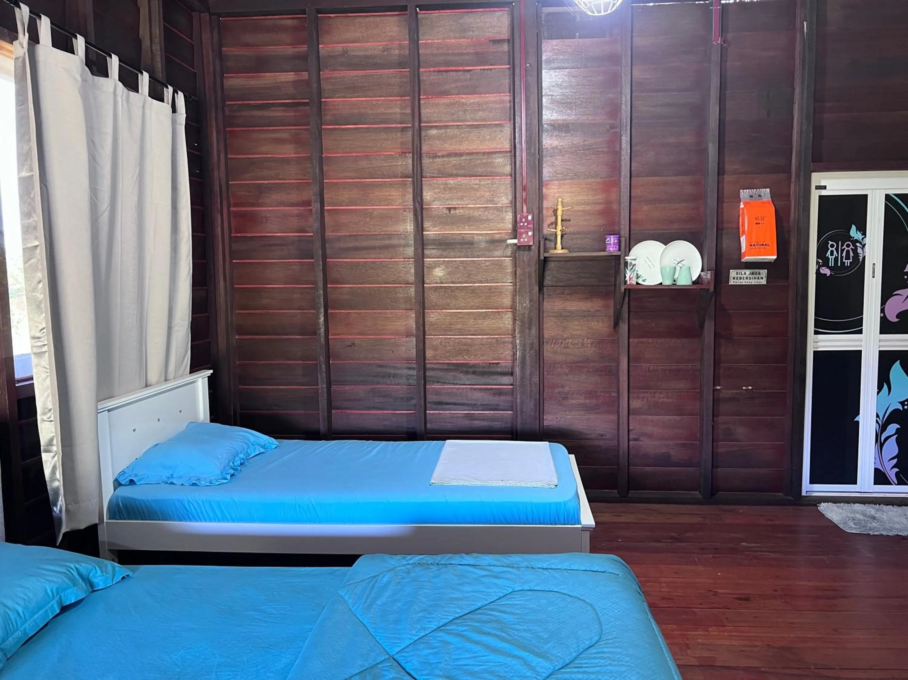 Bedroom in Hotel O Sri Ayu Inn