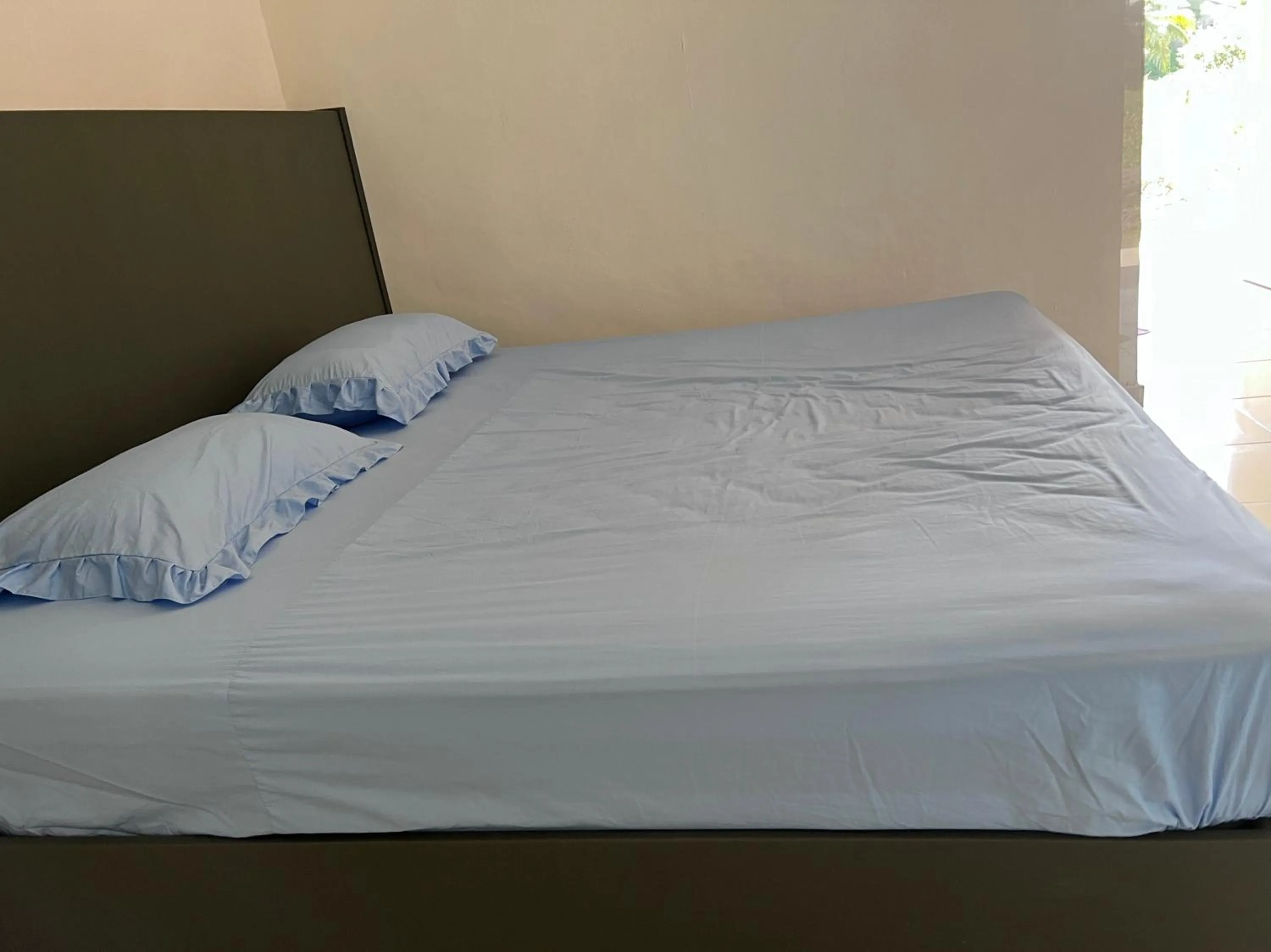 Bedroom in Hotel O Sri Ayu Inn