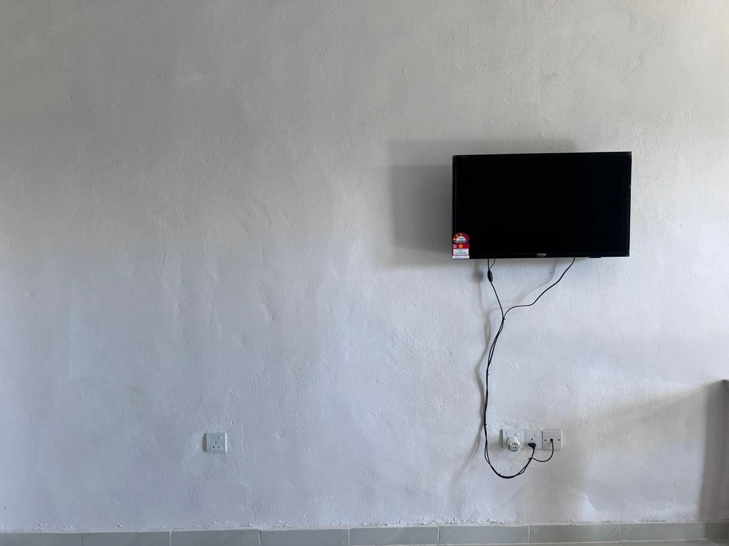 Bedroom in Hotel O Sri Ayu Inn