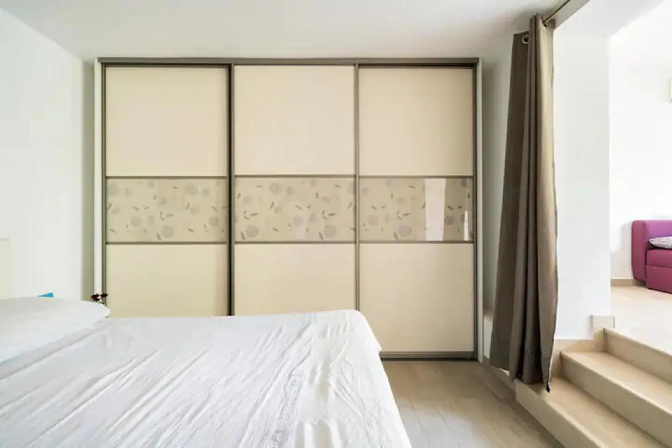 Bed in Studio Apartment Lemon