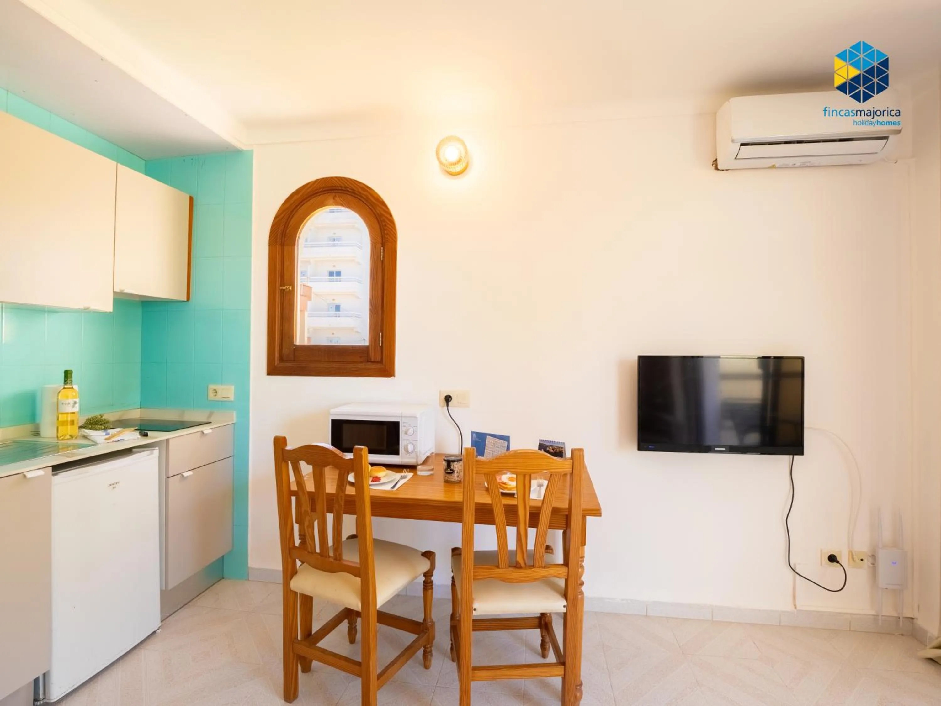 Kitchen or kitchenette in Apartamentos Bella María