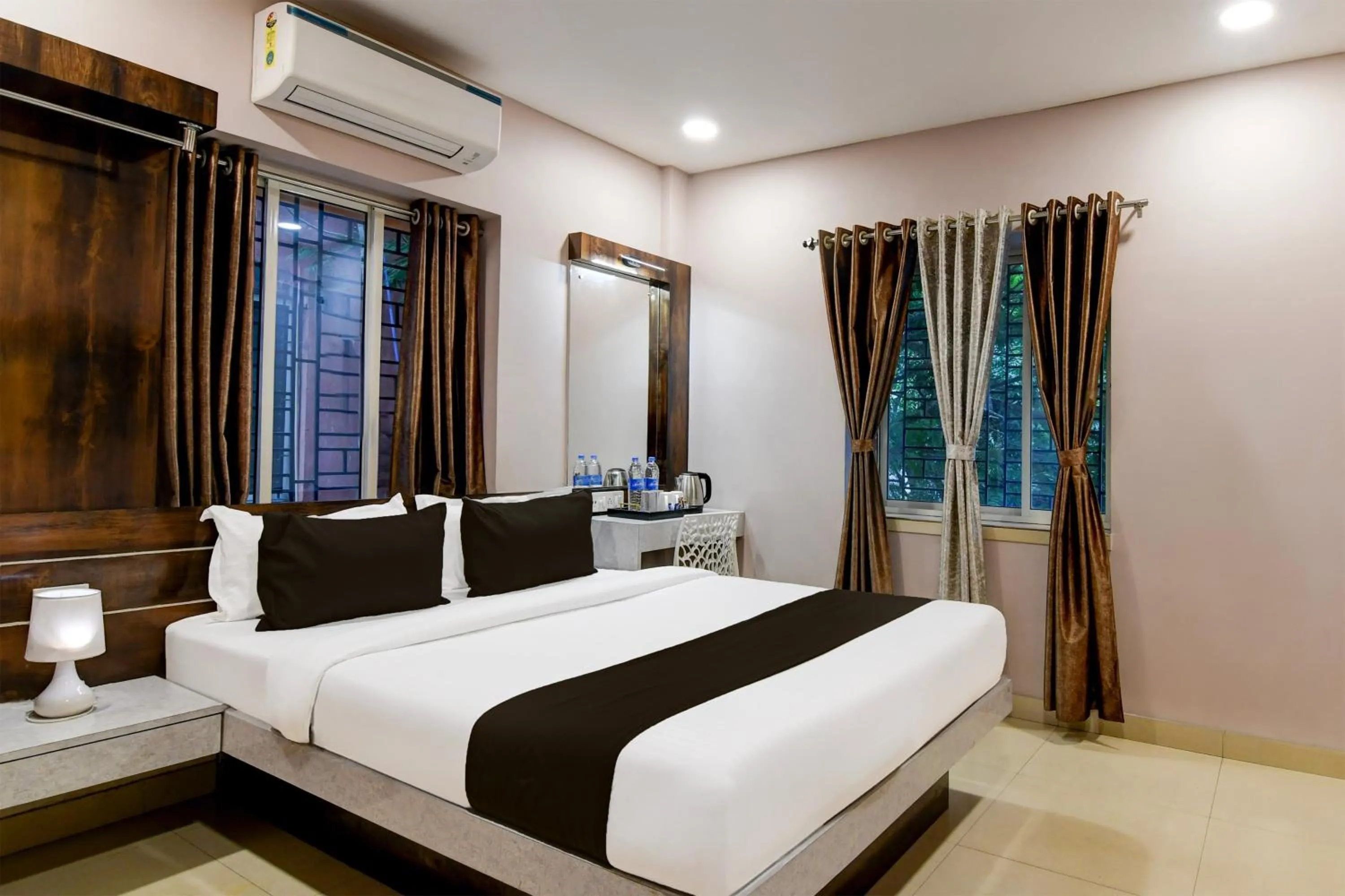 Bedroom, Bed in Super Collection O New Town Near OM Sweets Formerly Shiva Inn