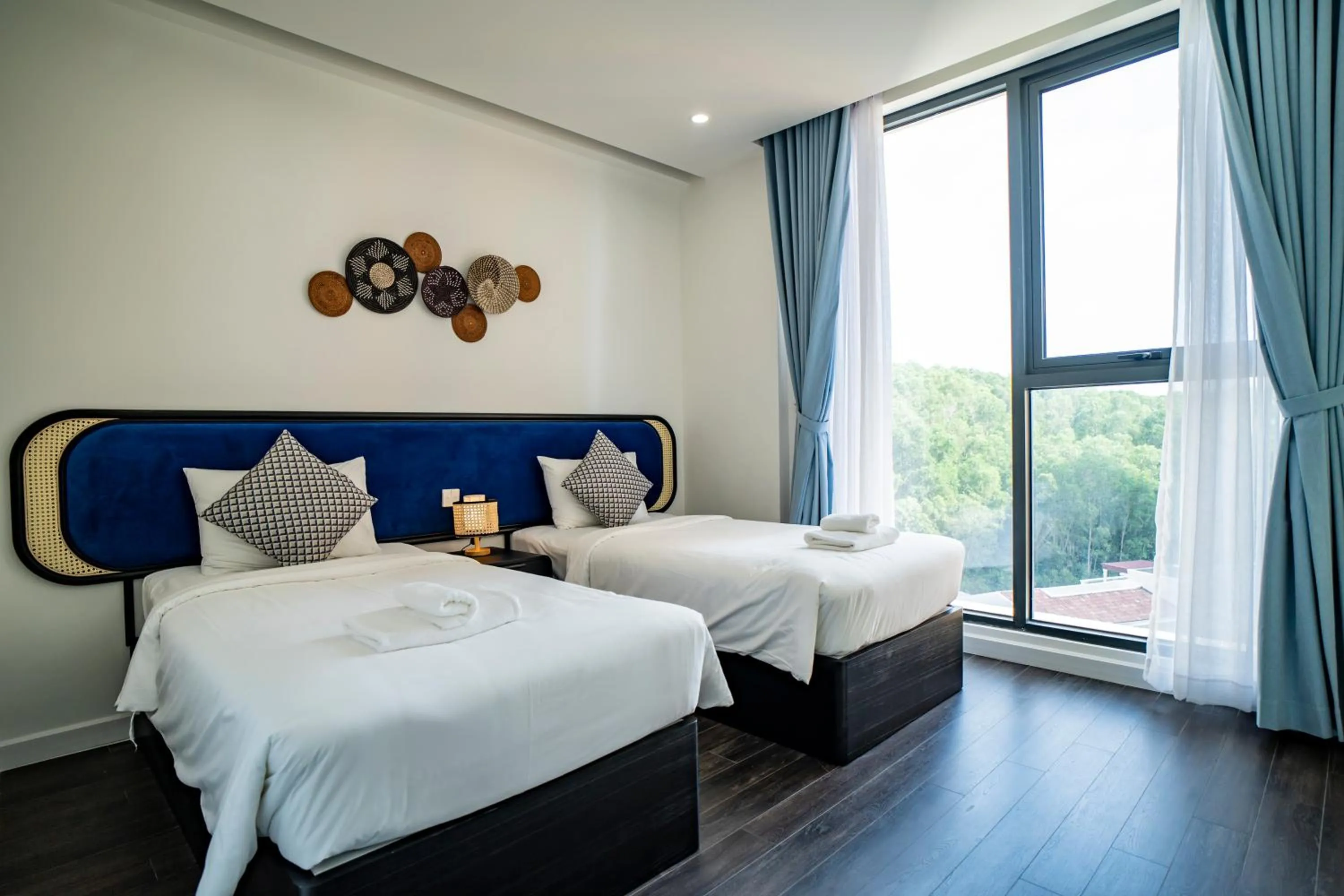 Bed in We Young Apartments by HOFs - Fireworks & Ocean view