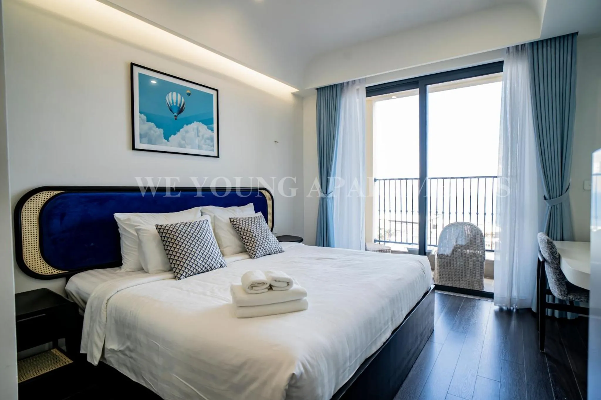 Bed in We Young Apartments by HOFs - Fireworks & Ocean view