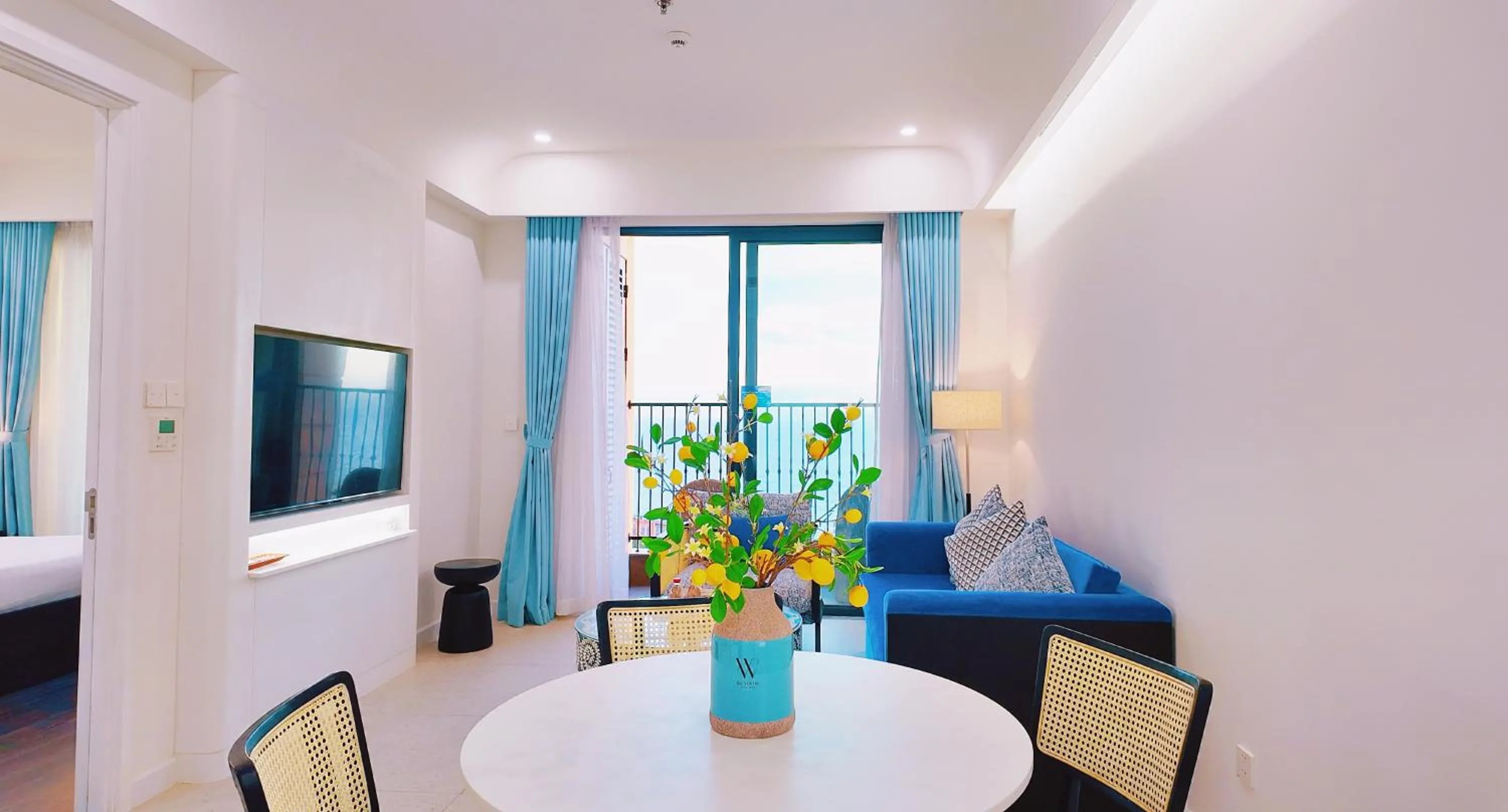 Living room, Bed in We Young Apartments by HOFs - Fireworks & Ocean view