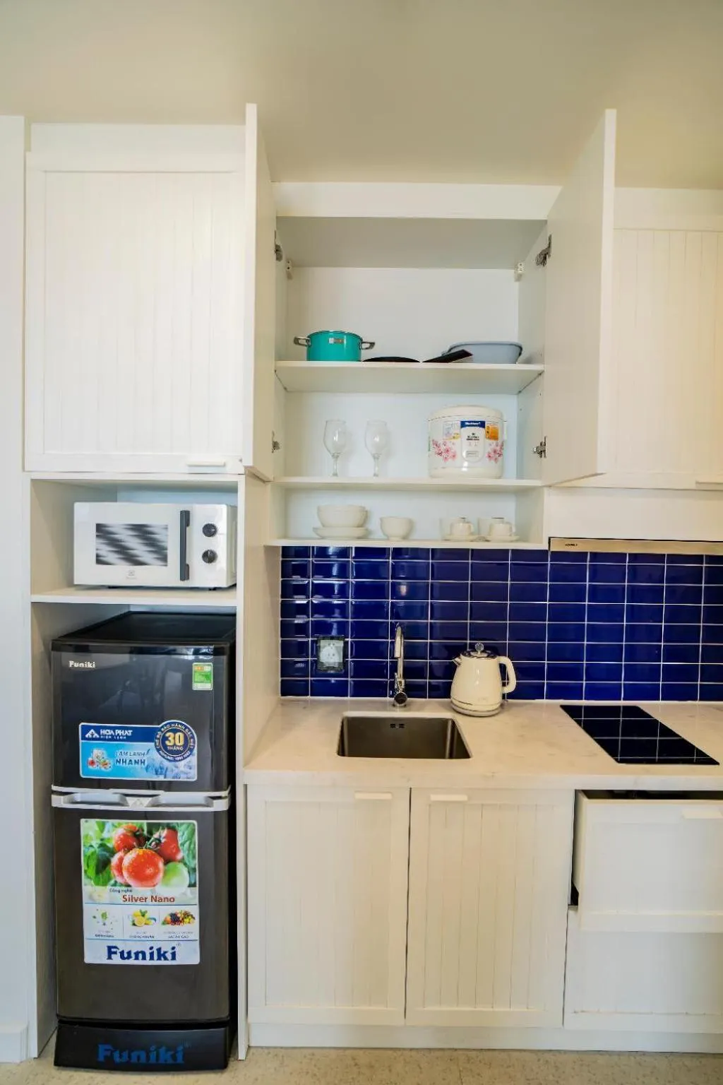 Kitchen or kitchenette in We Young Apartments by HOFs - Fireworks & Ocean view
