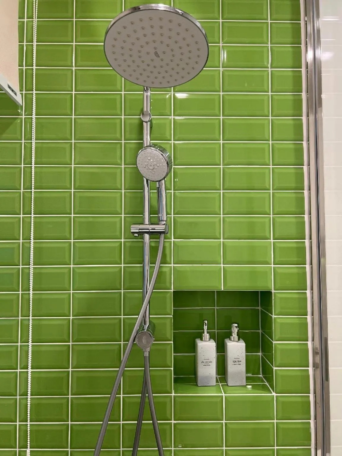 Shower in We Young Apartments by HOFs - Fireworks & Ocean view