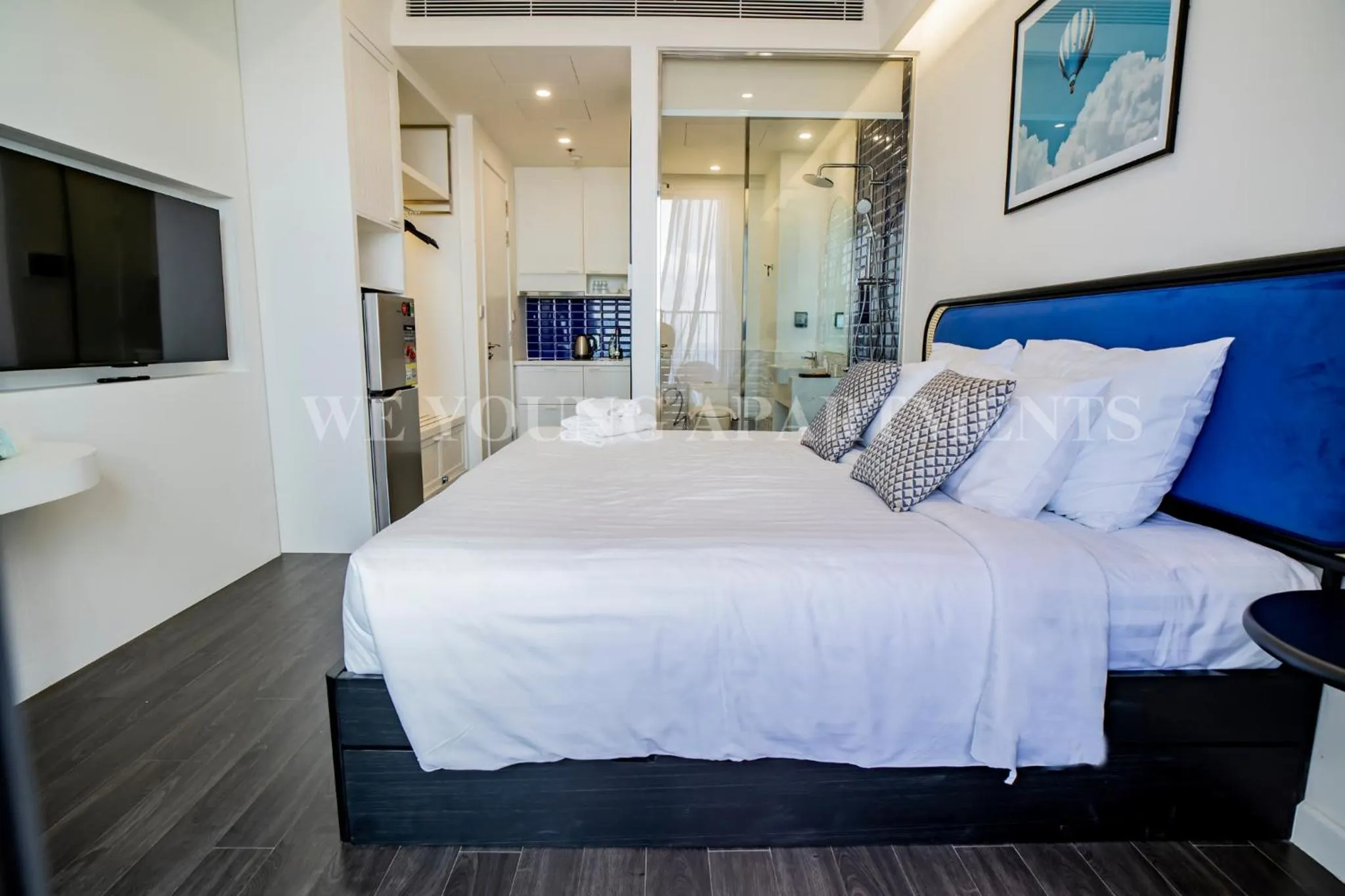 Bedroom, Bed in We Young Apartments by HOFs - Fireworks & Ocean view