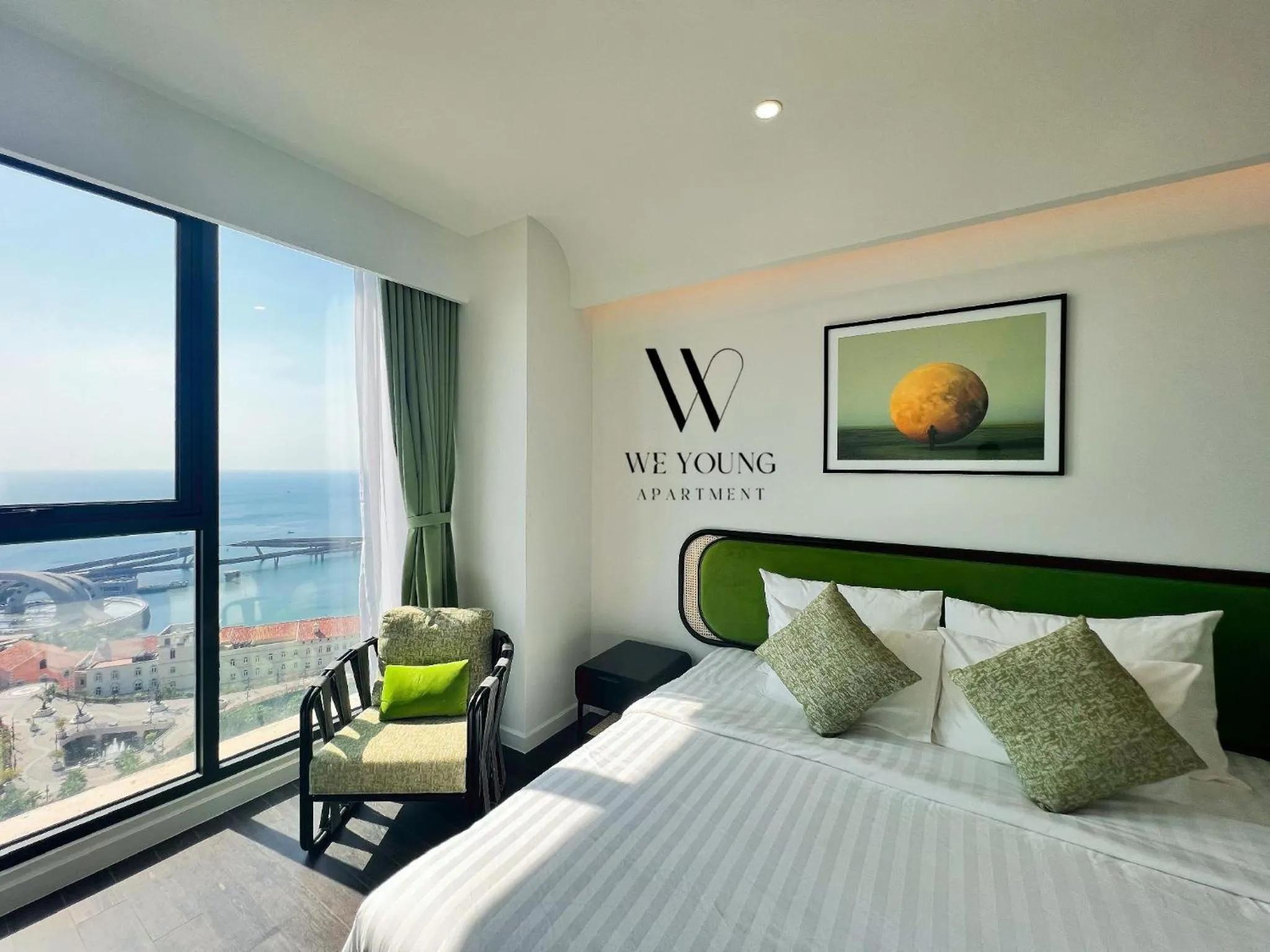 Bed in We Young Apartments by HOFs - Fireworks & Ocean view