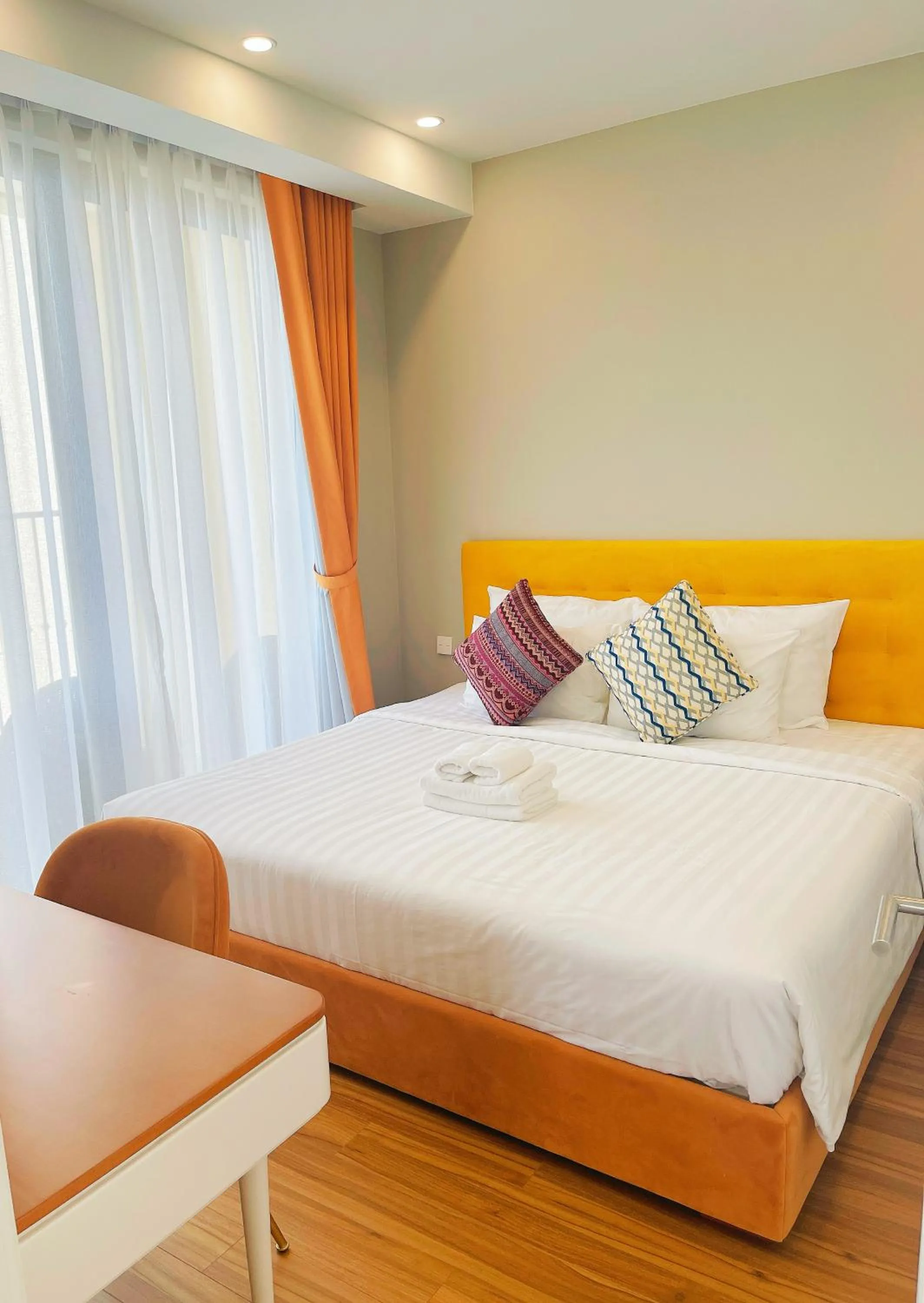 Bed in We Young Apartments by HOFs - Fireworks & Ocean view