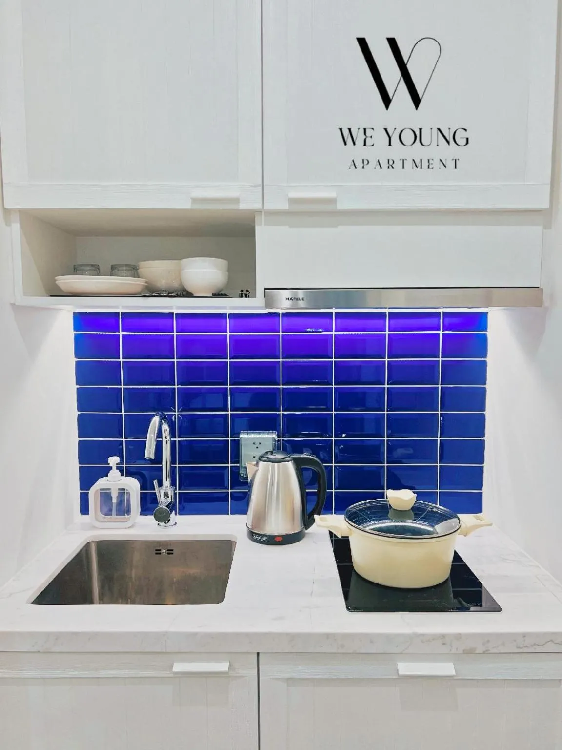 Kitchen or kitchenette in We Young Apartments by HOFs - Fireworks & Ocean view