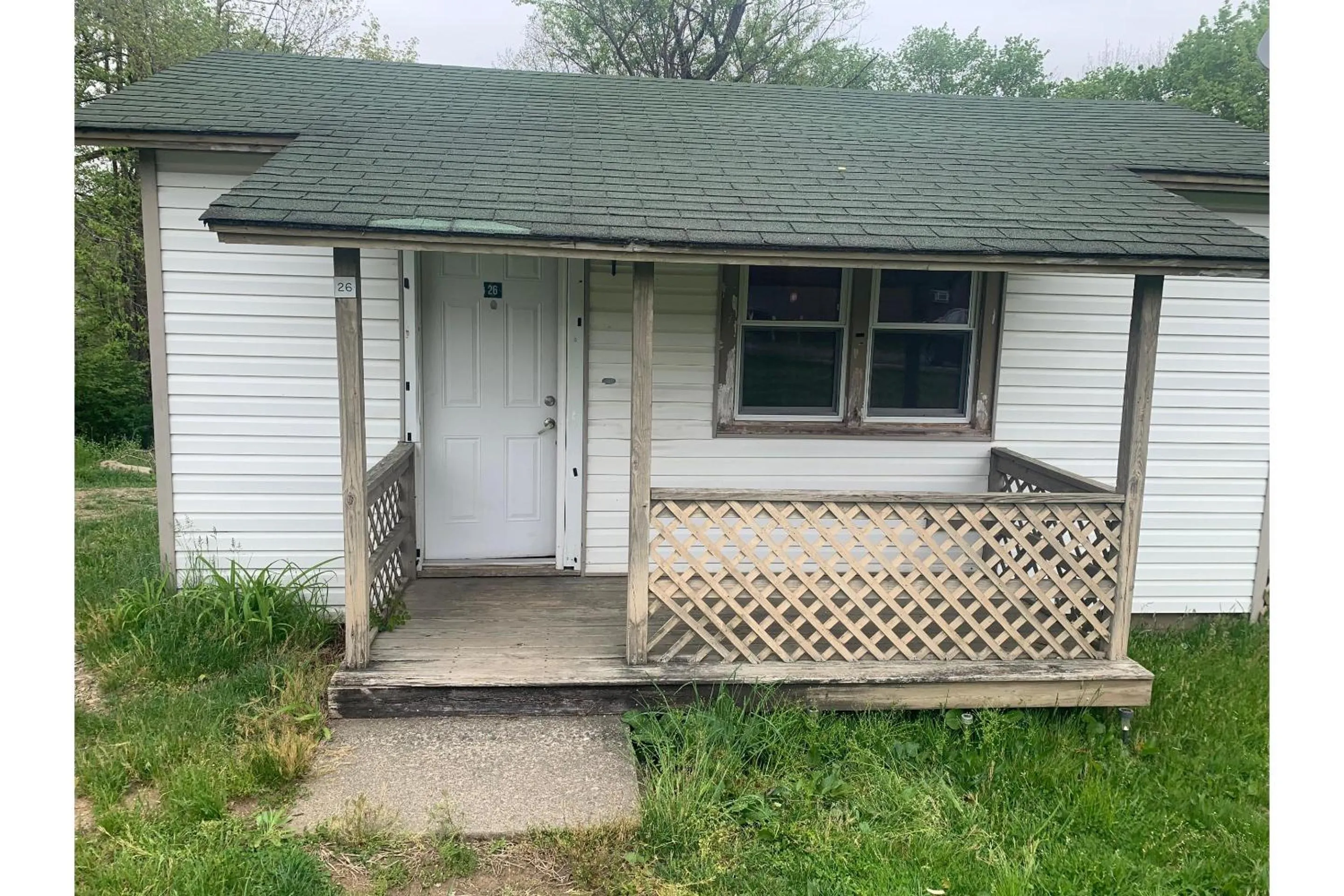 Bedroom in Werry's Cottages and Pub By OYO East Stroudsborg - Weekly Stays