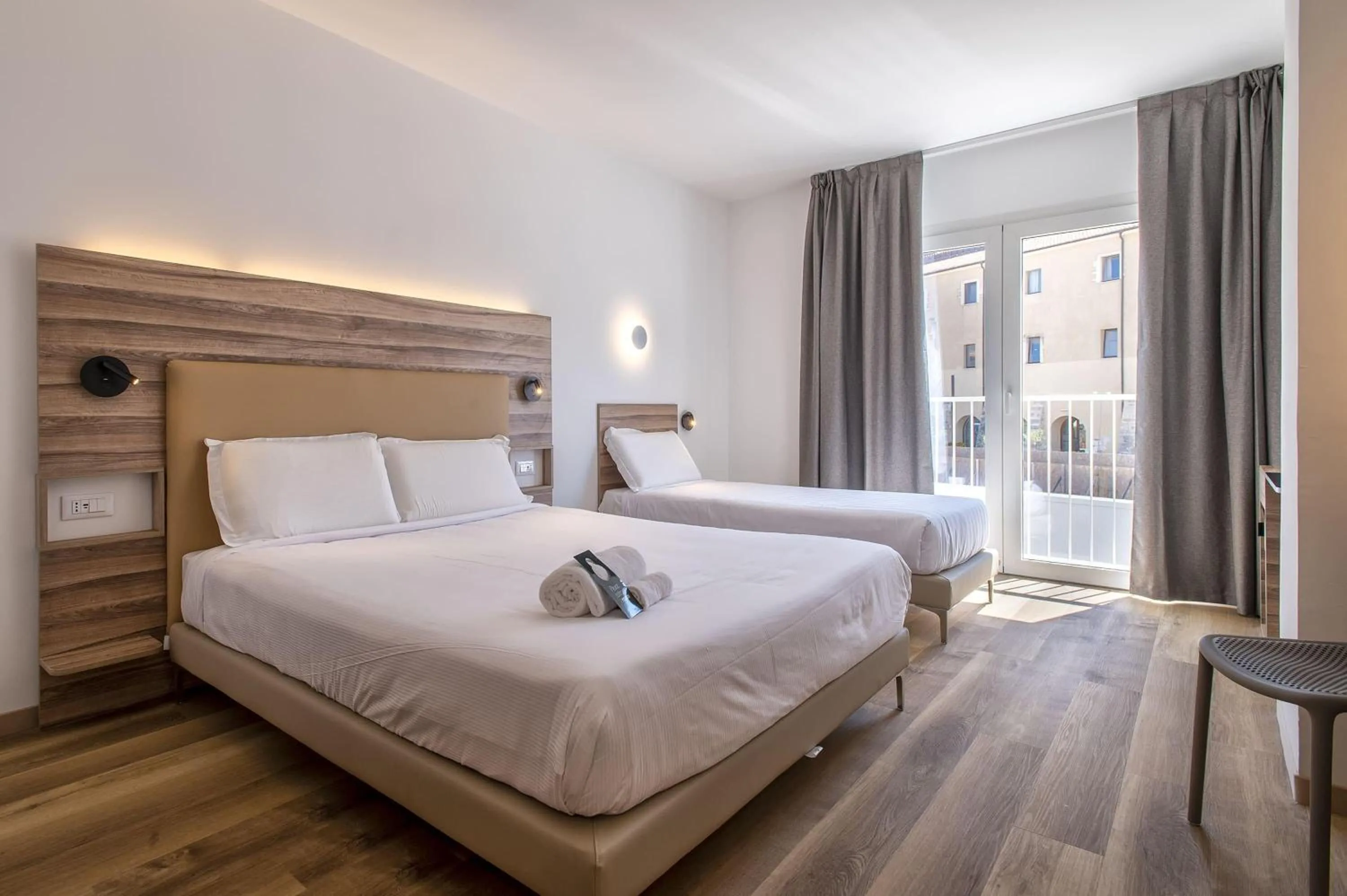 Photo of the whole room, Bed in B&B HOTEL Sassari