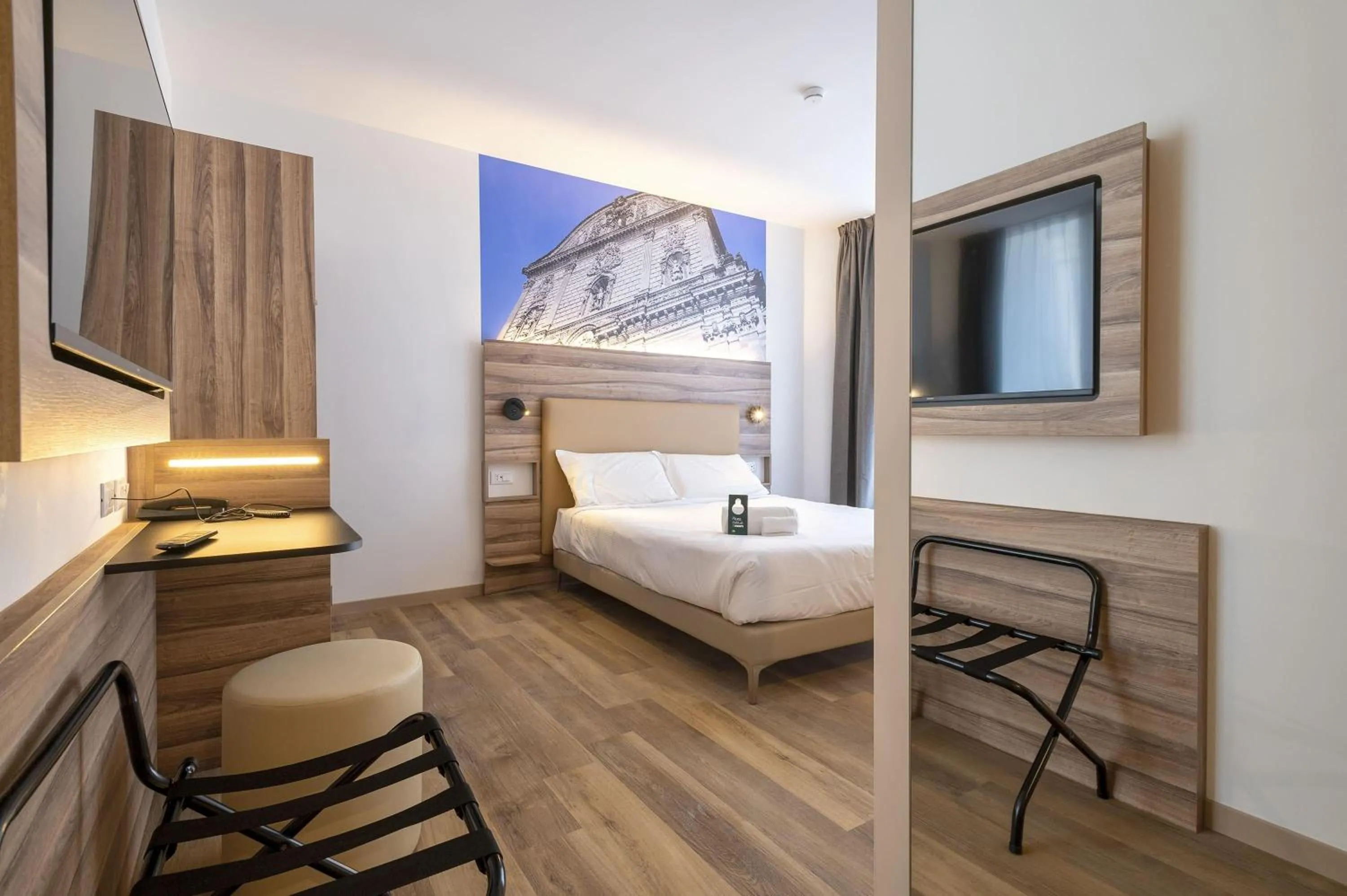 Bathroom, Bed in B&B HOTEL Sassari