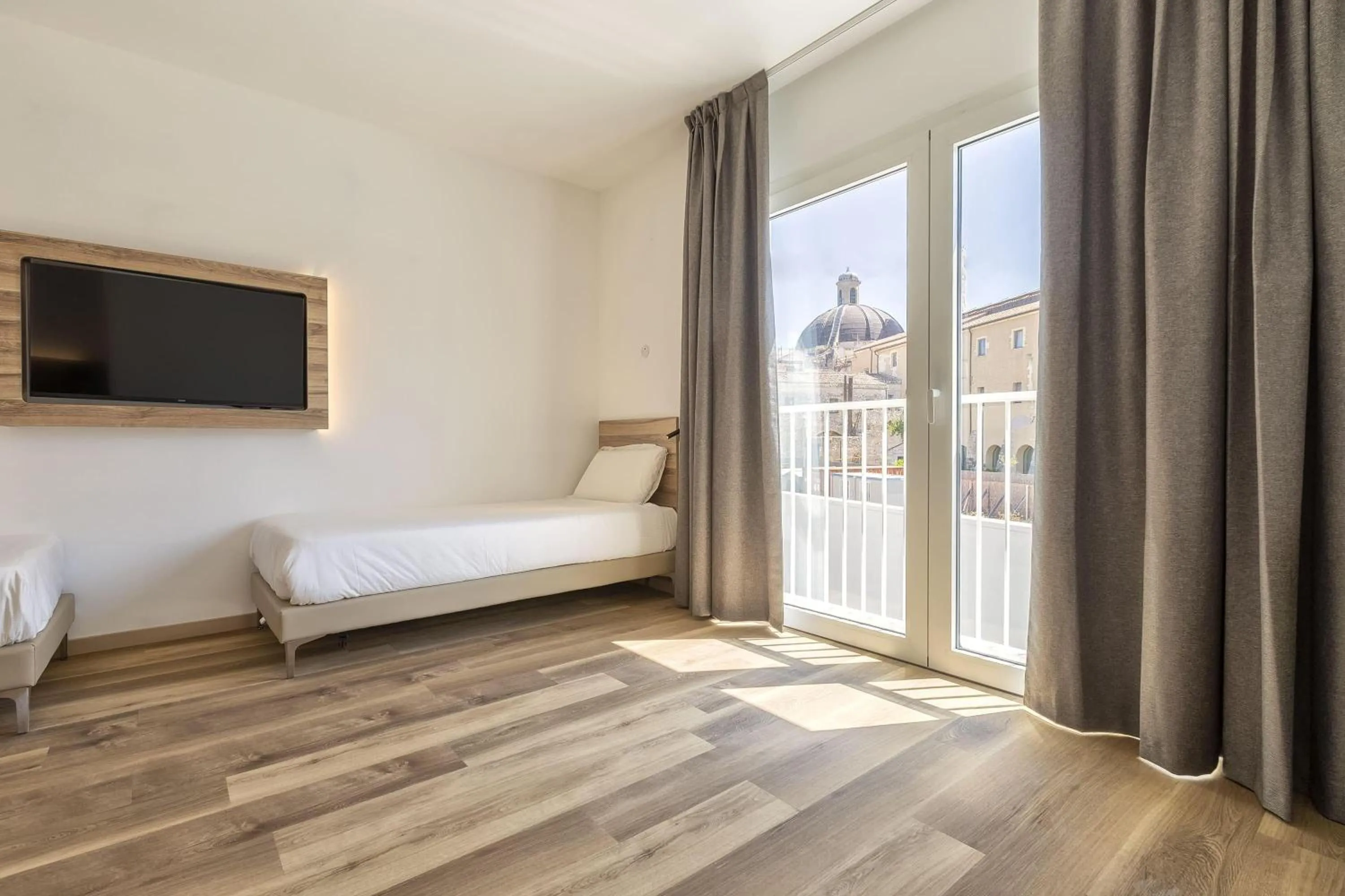 Photo of the whole room, Bed in B&B HOTEL Sassari