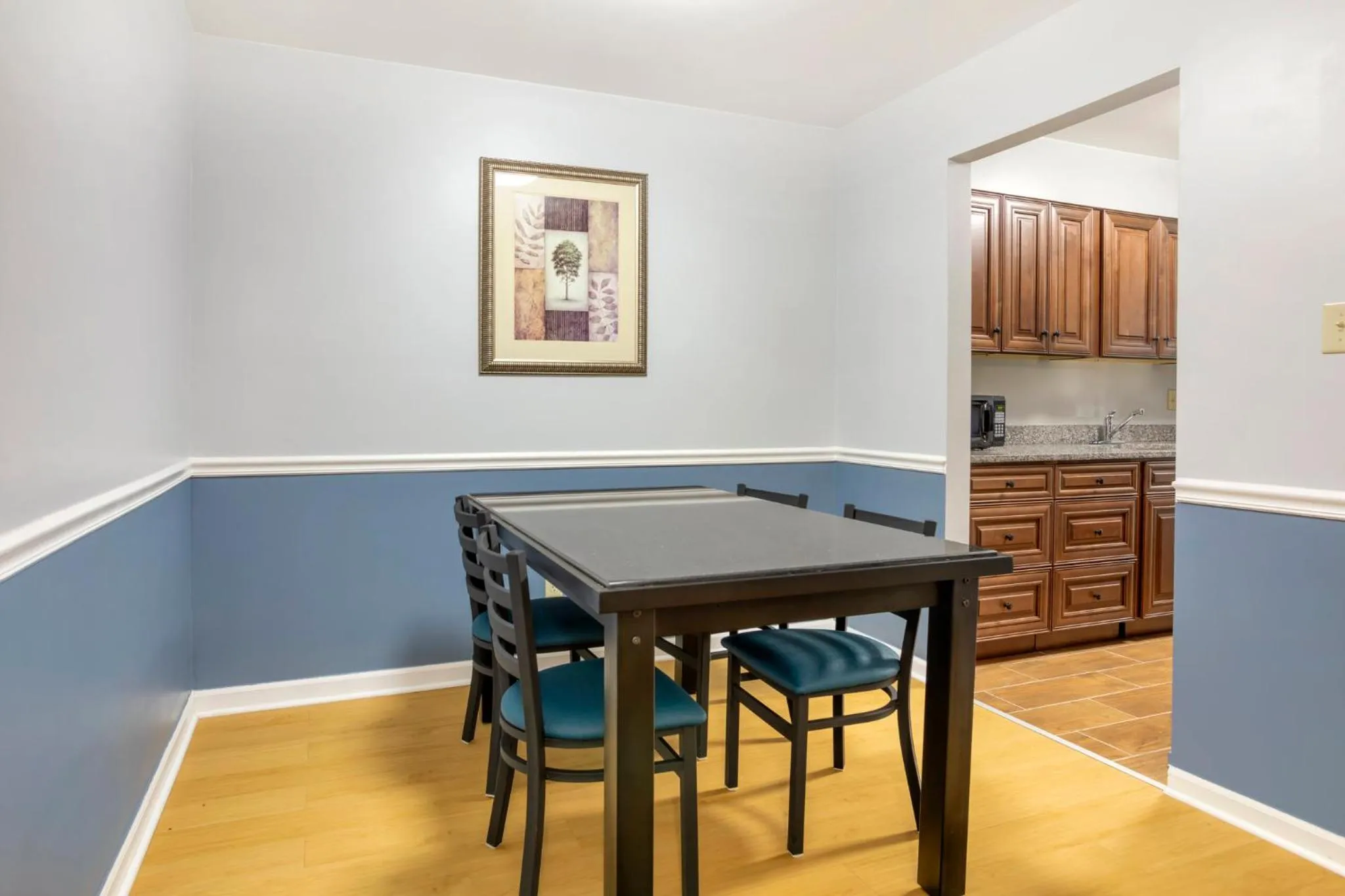 Photo of the whole room in HomeTowne Studios by Red Roof Huntsville - Madison