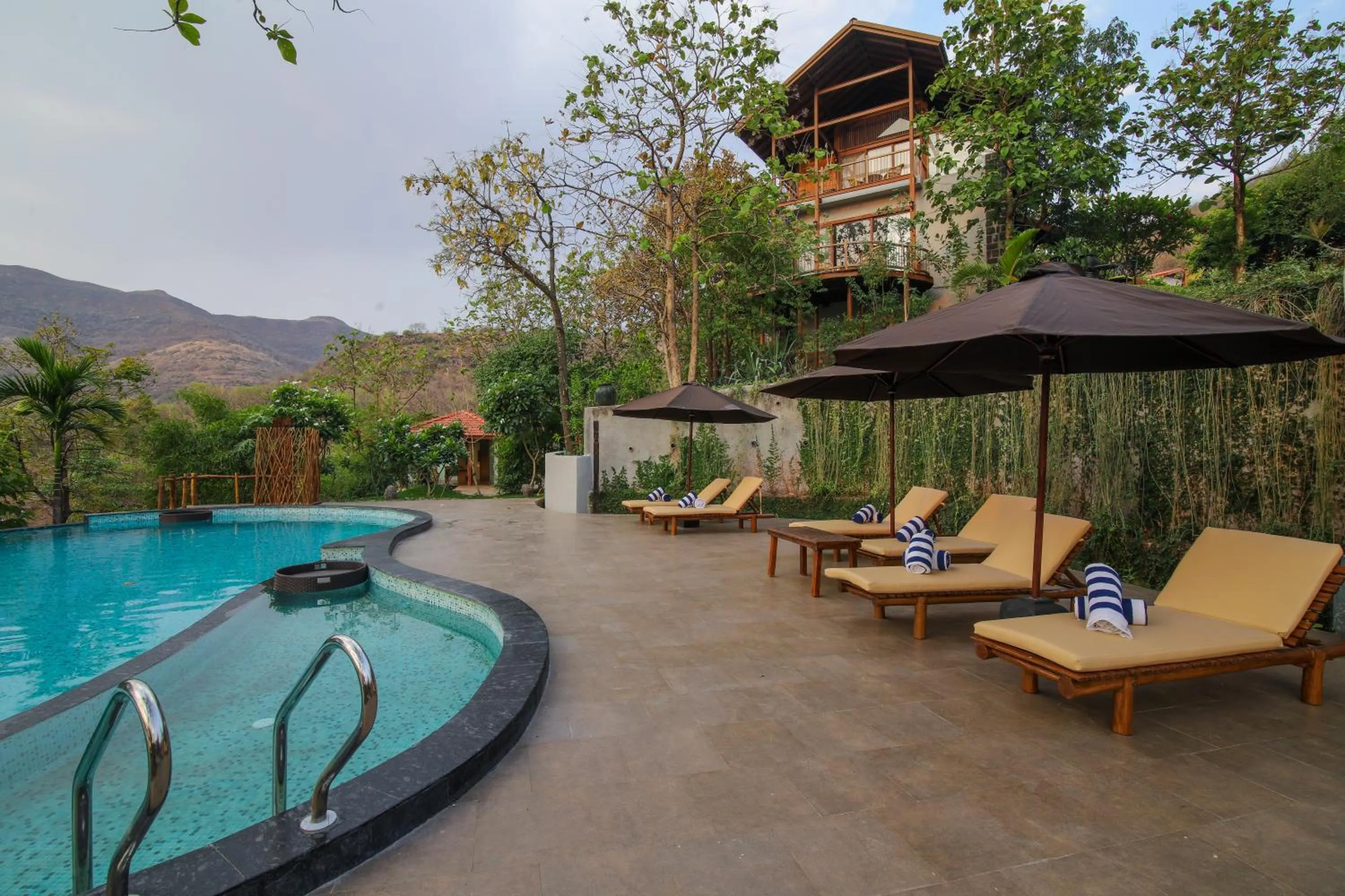 Swimming pool in Toyam by Orchid Hotels