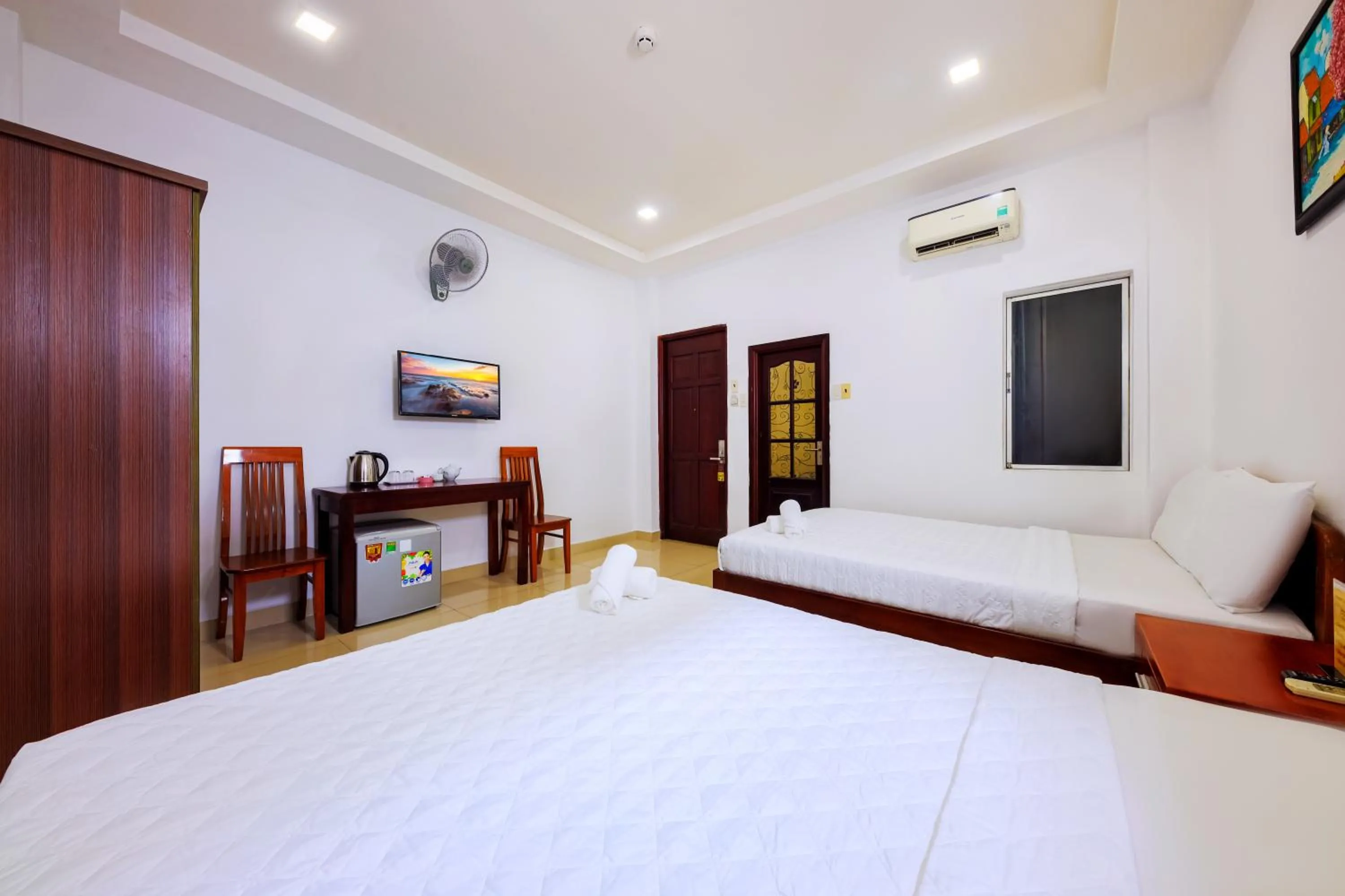 Bed in Mangolia Hotel