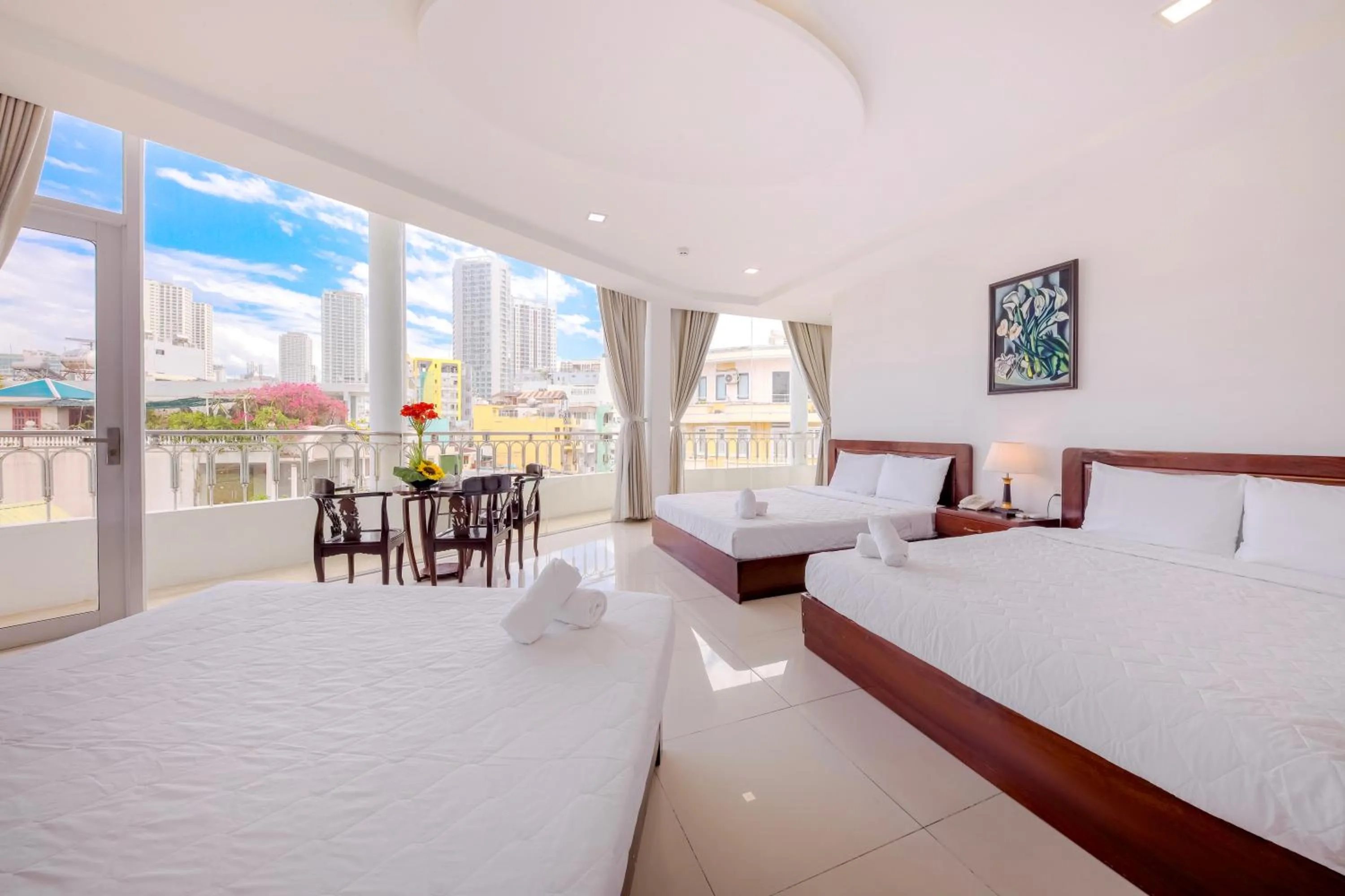 Bed in Mangolia Hotel