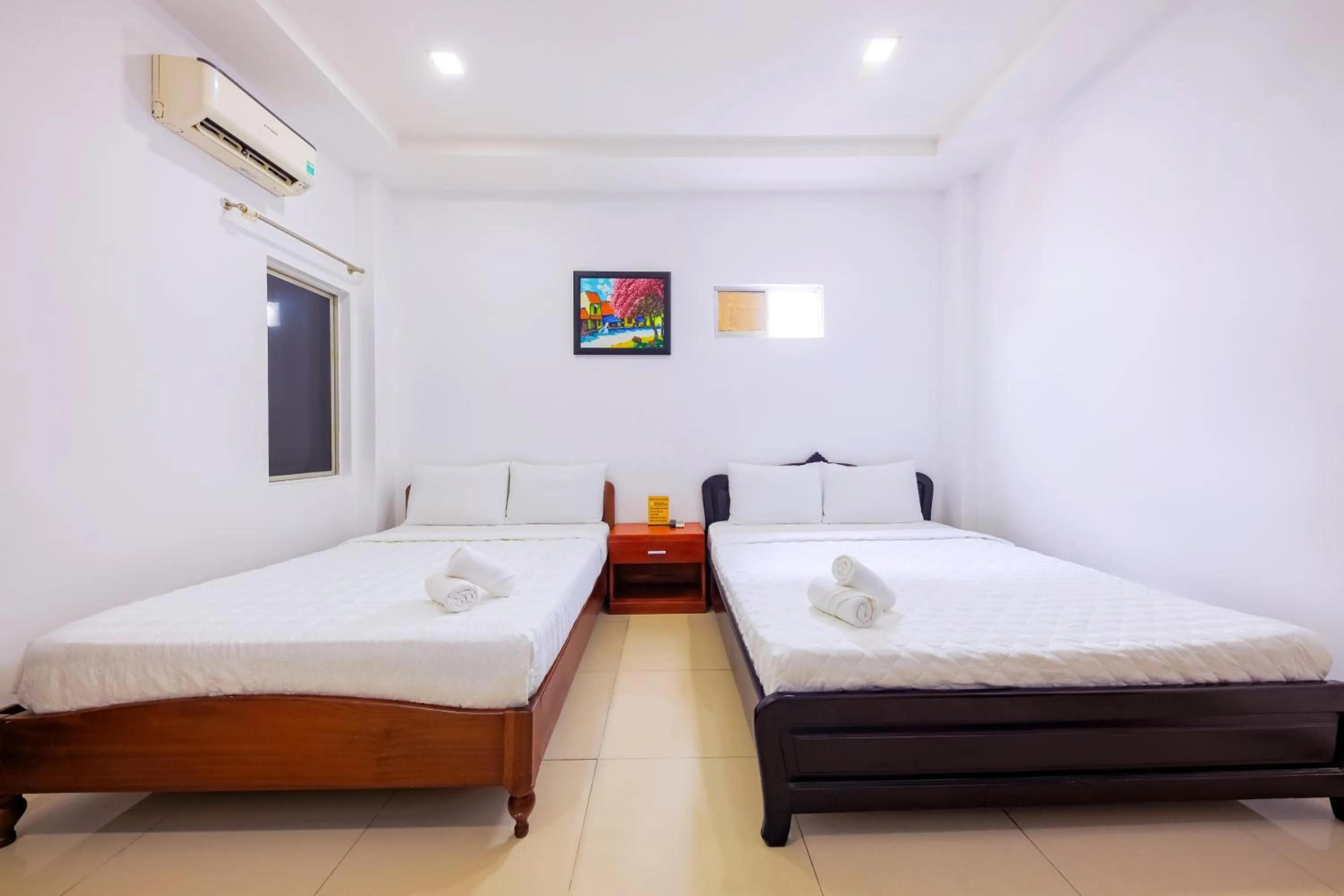 Bed in Mangolia Hotel