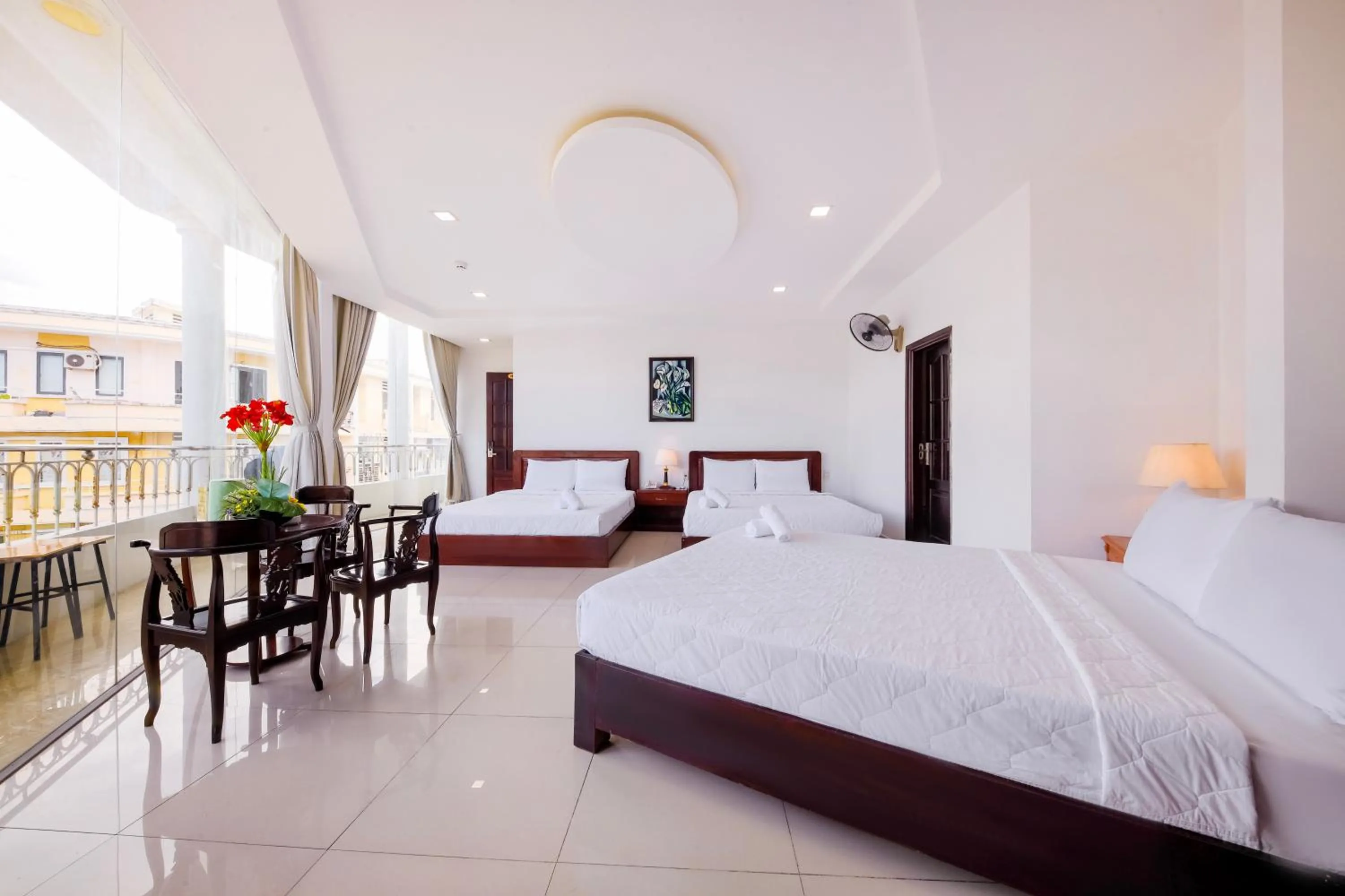 Bed in Mangolia Hotel
