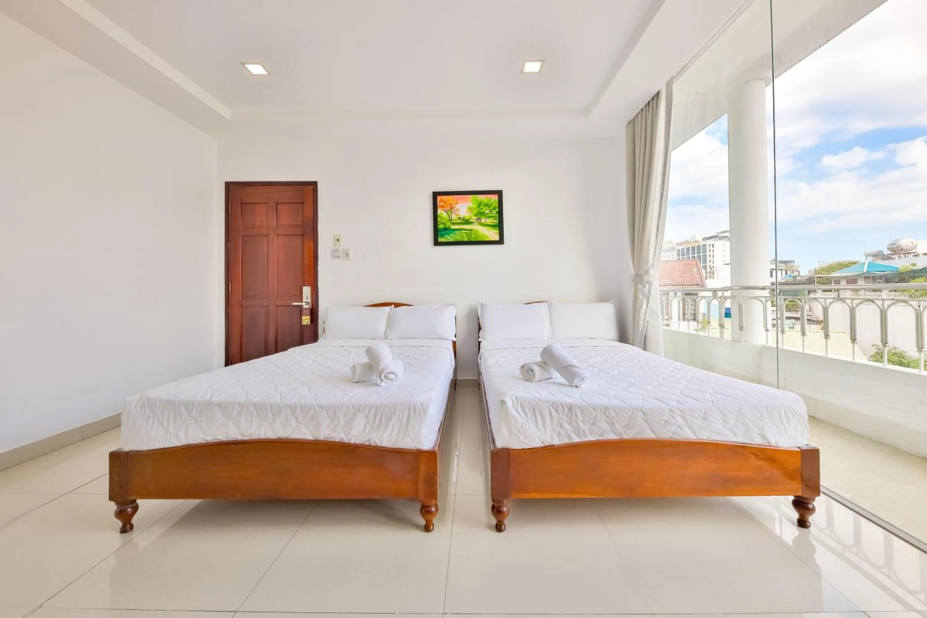 Bed in Mangolia Hotel