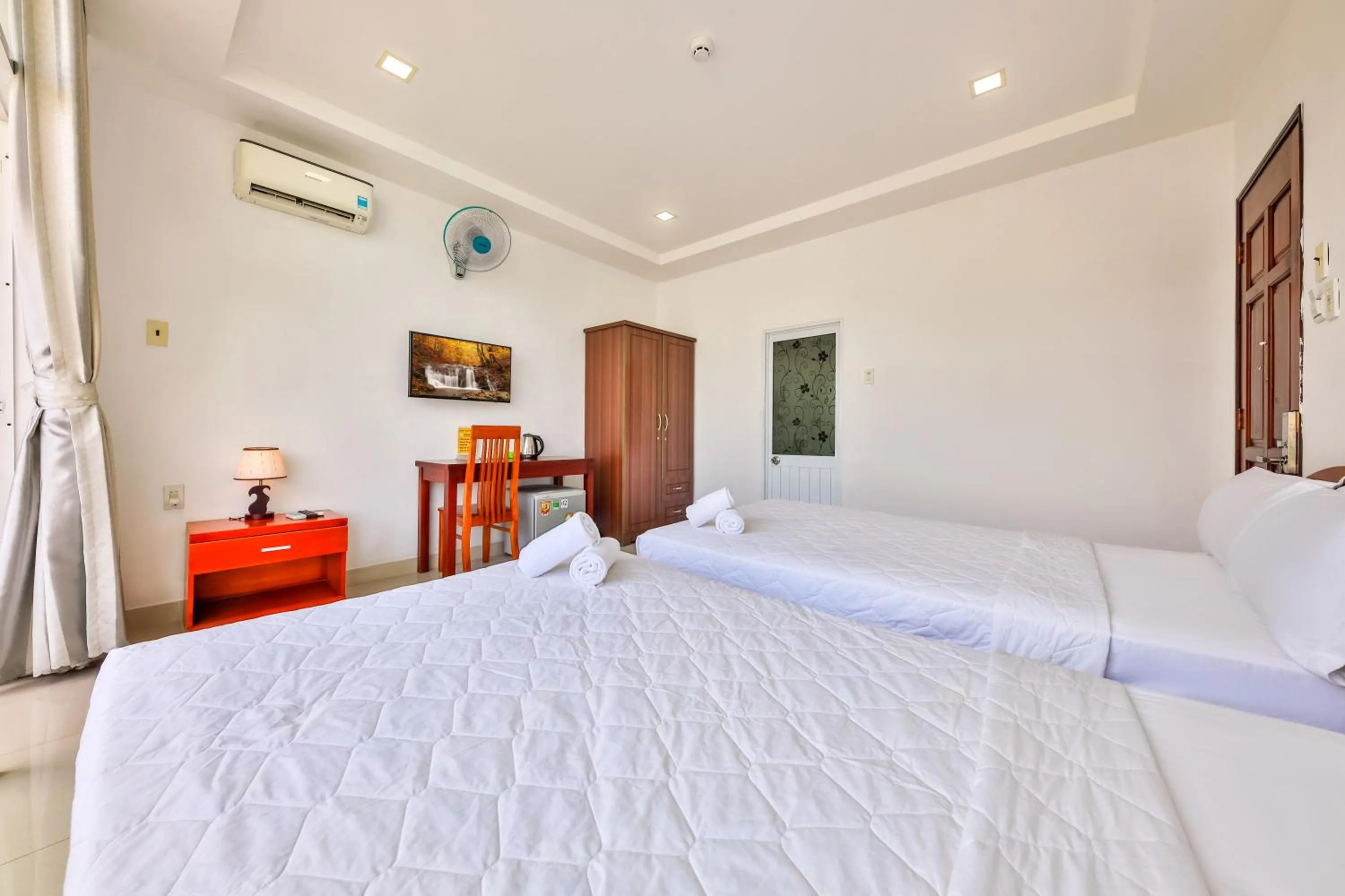 Bed in Mangolia Hotel