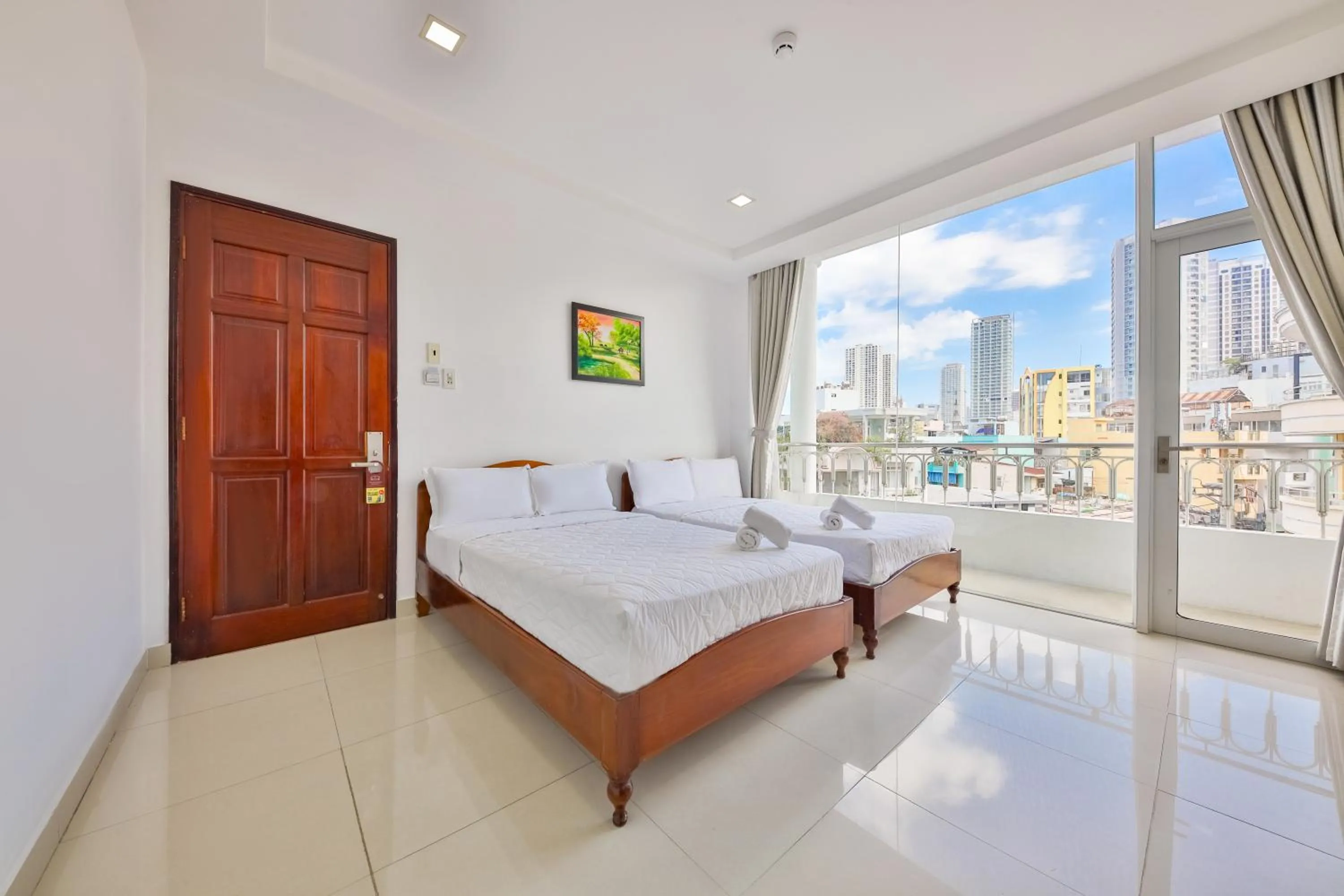 Bed in Mangolia Hotel