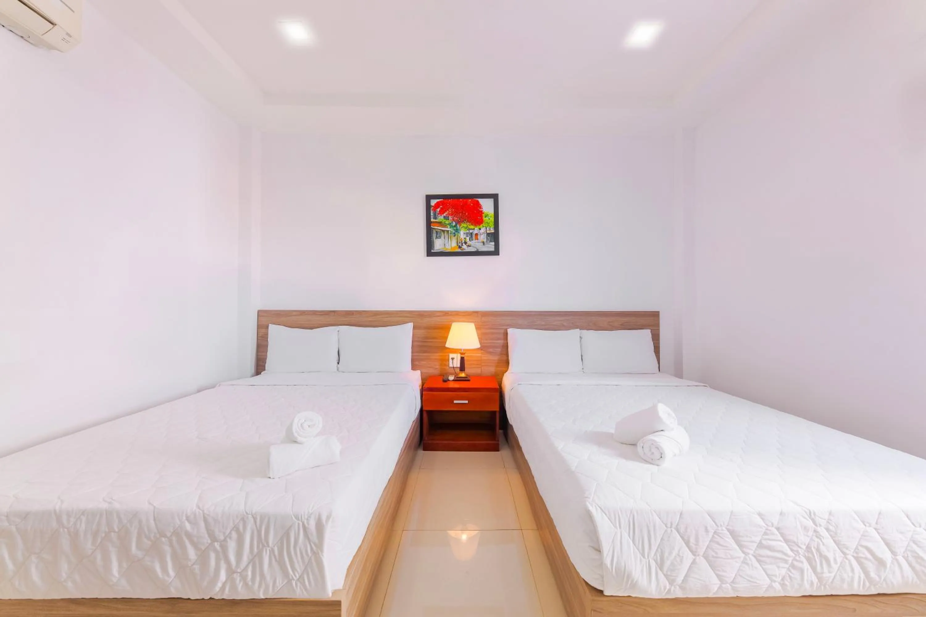 Bed in Mangolia Hotel