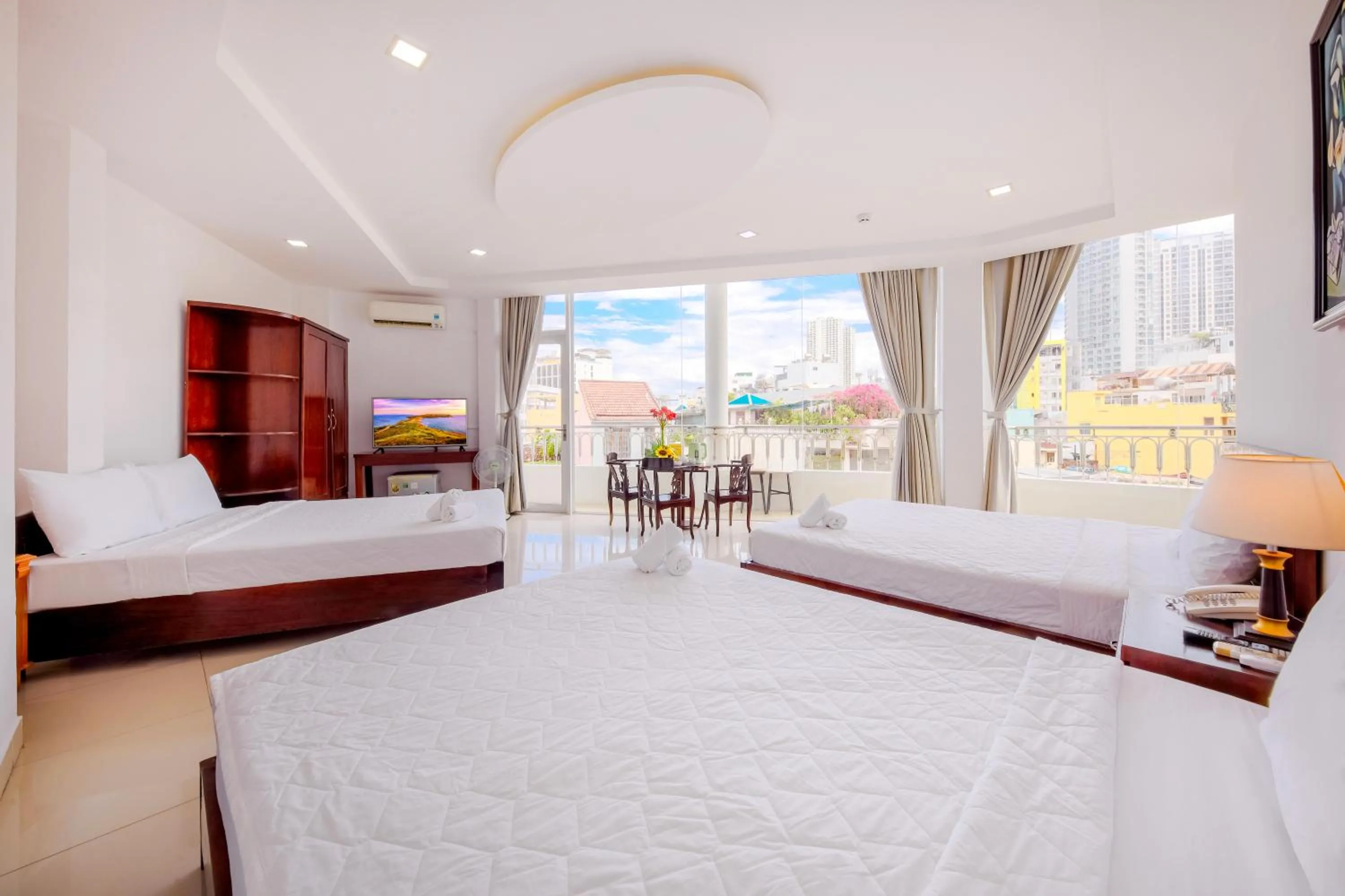Bed in Mangolia Hotel