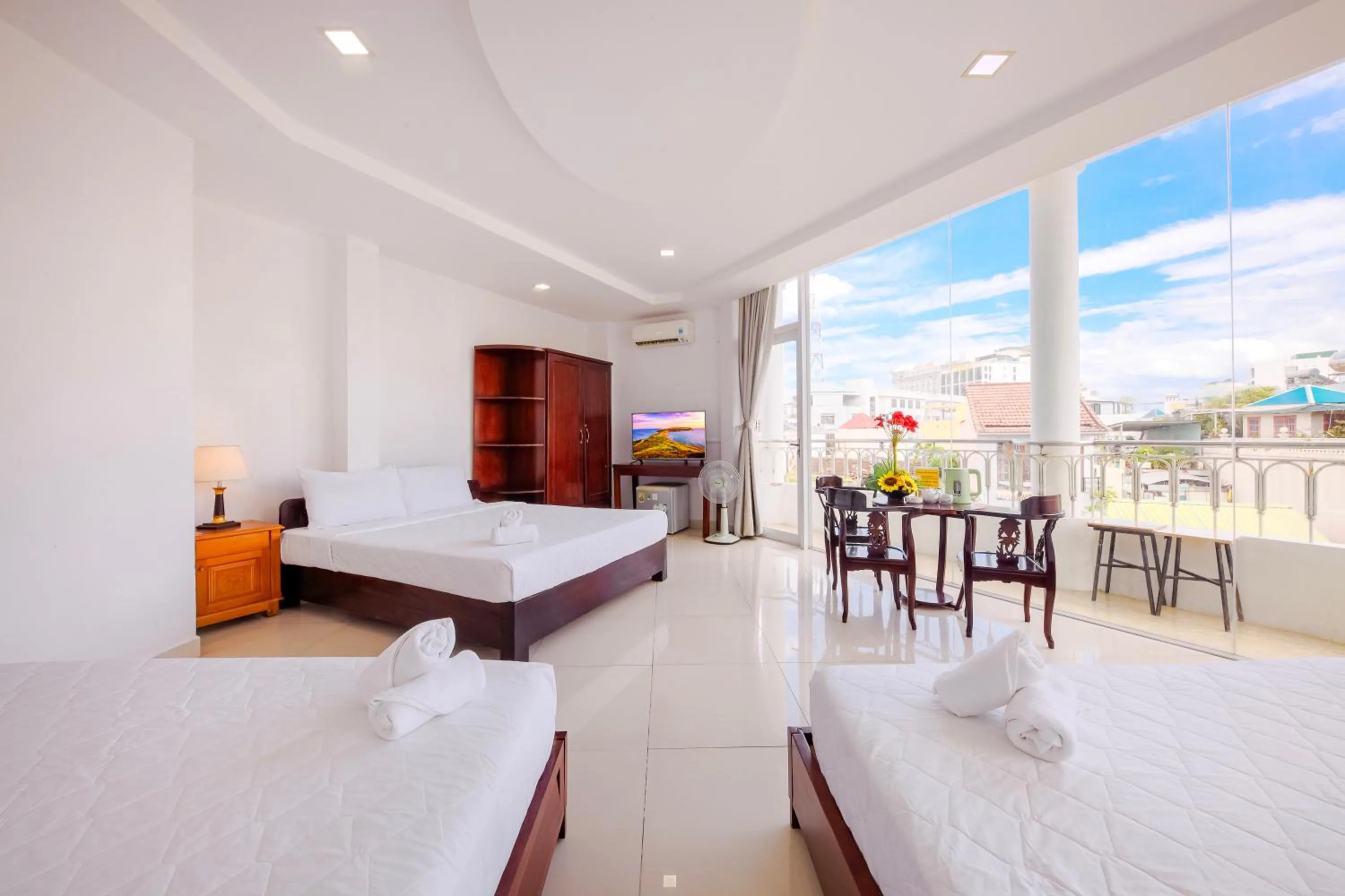 Bed in Mangolia Hotel